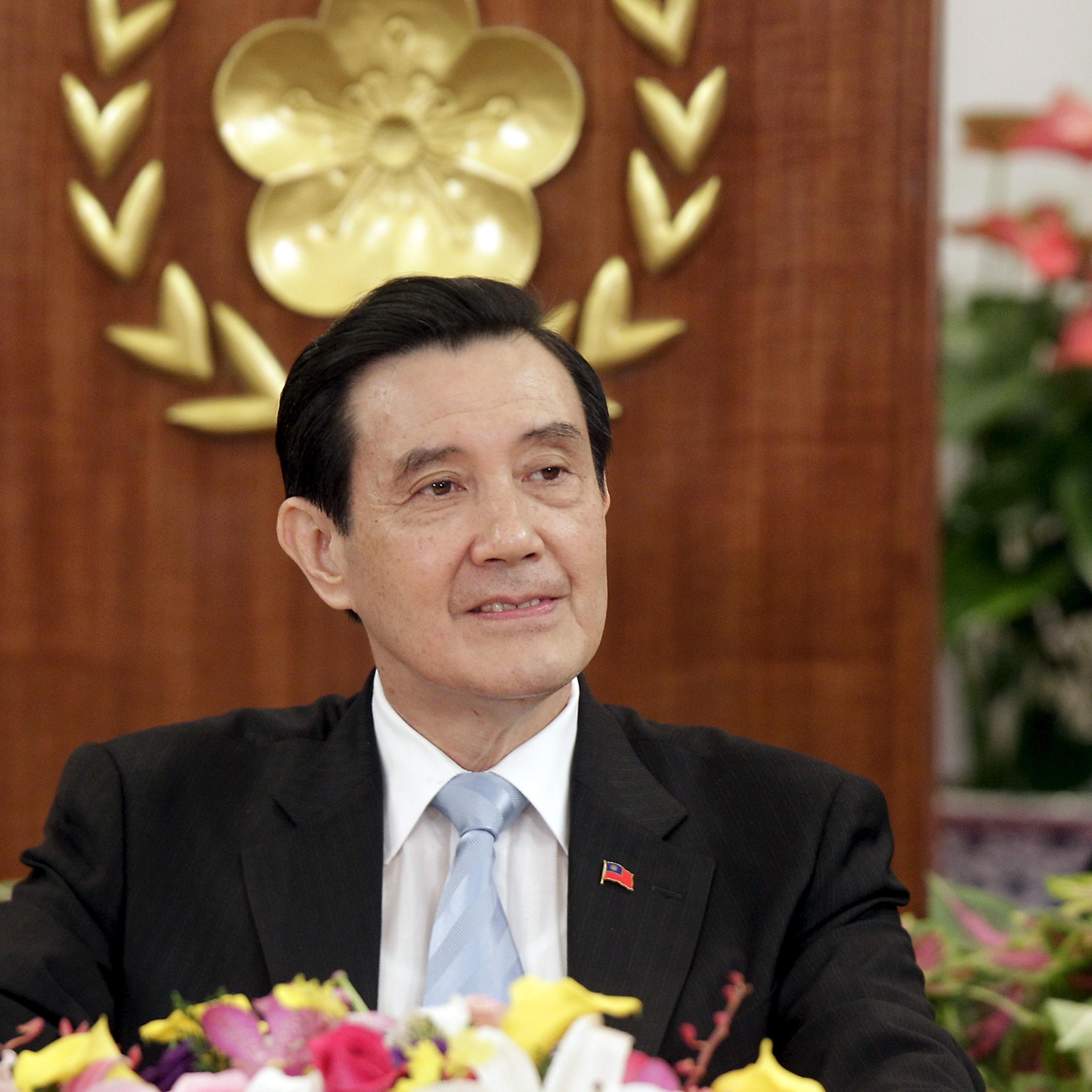 Taiwan's President Ma Ying-jeou listens to a question during a news conference before his upcoming meeting with Chinese President Xi Jinping, at the Presidential Office in Taipei