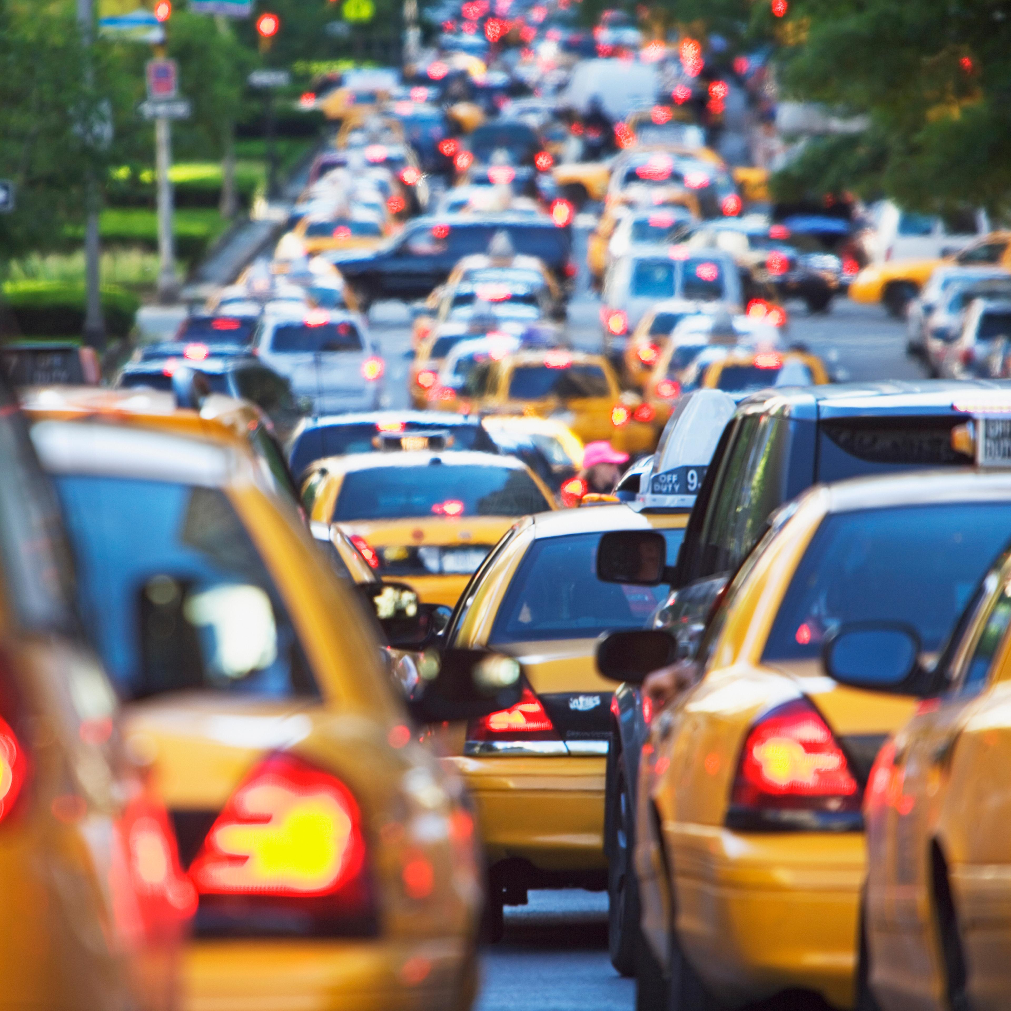 Taxis in rush hour traffic