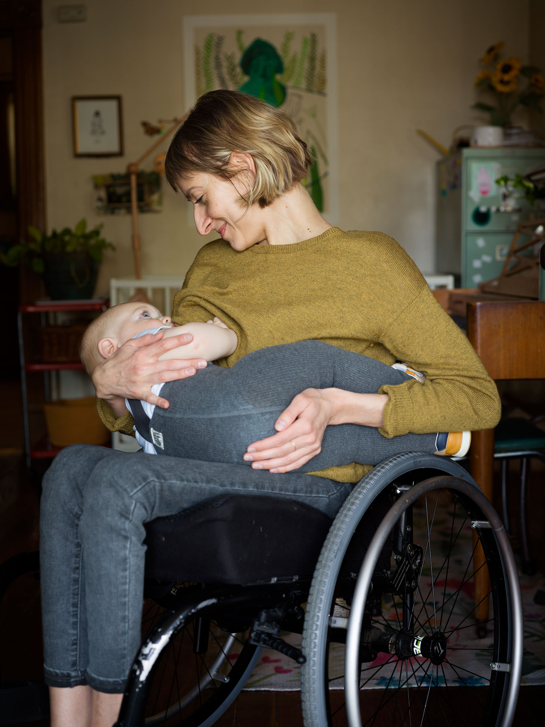 Rebekah Taussig breastfeeds her son, Otto, in their home in April 2021.