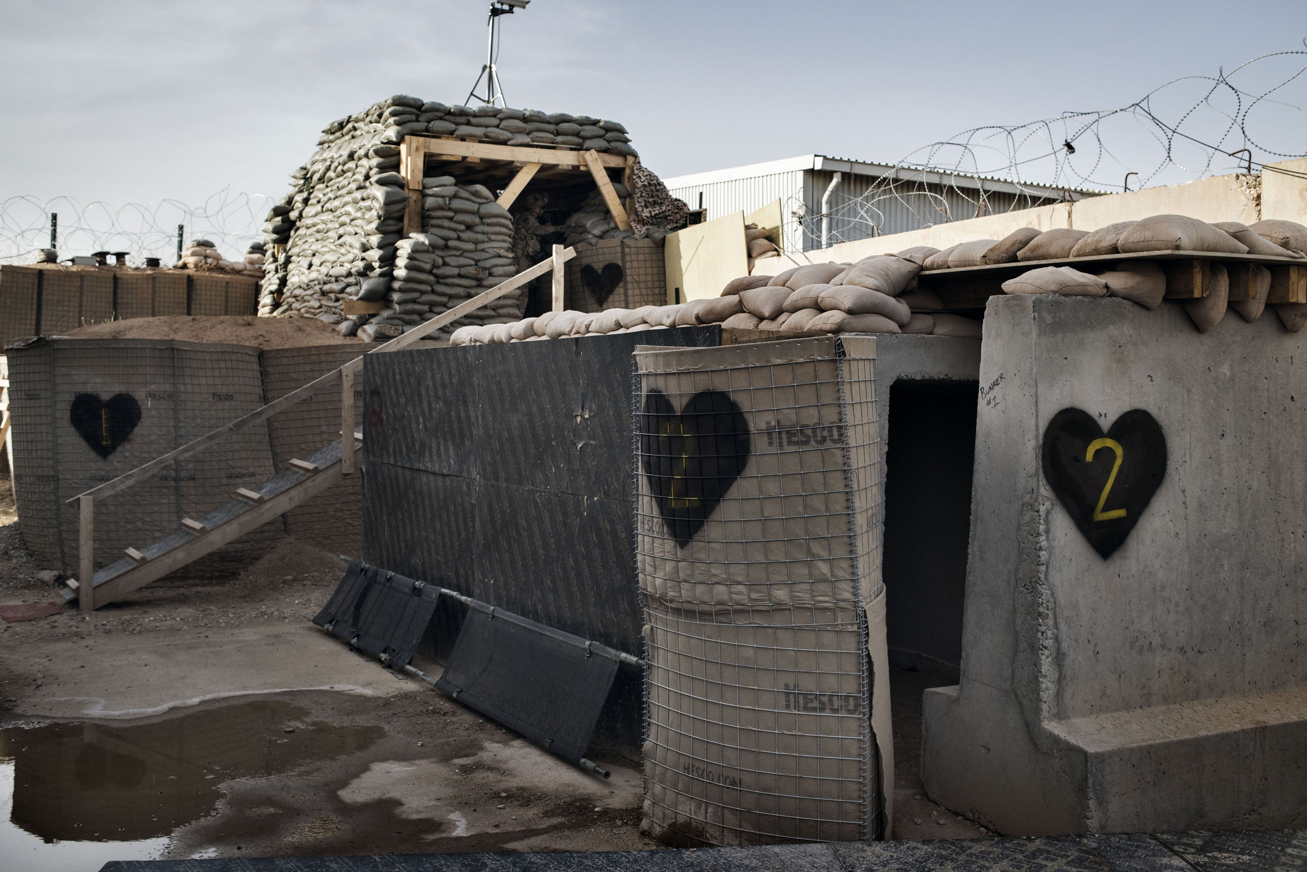 Hearts, the insignia of the U.S. Army's 101st Airborne Division, are painted on the fortifications at Camp Swift, a U.S. forward base near the Iraqi town of Makhmour, May 17, 2016.