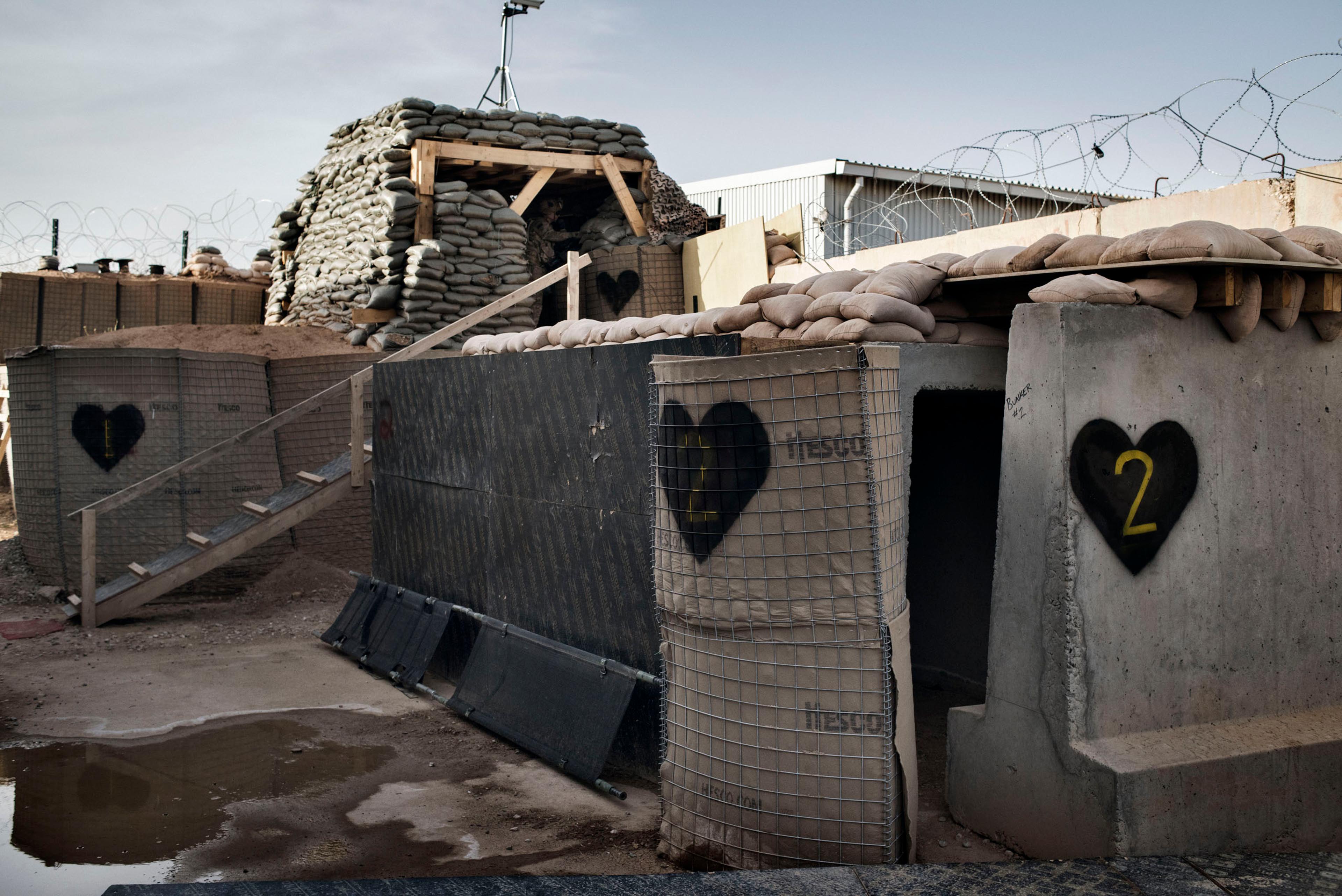 Hearts, the insignia of the U.S. Army's 101st Airborne Division, are painted on the fortifications at Camp Swift, a U.S. forward base near the Iraqi town of Makhmour, May 17, 2016.