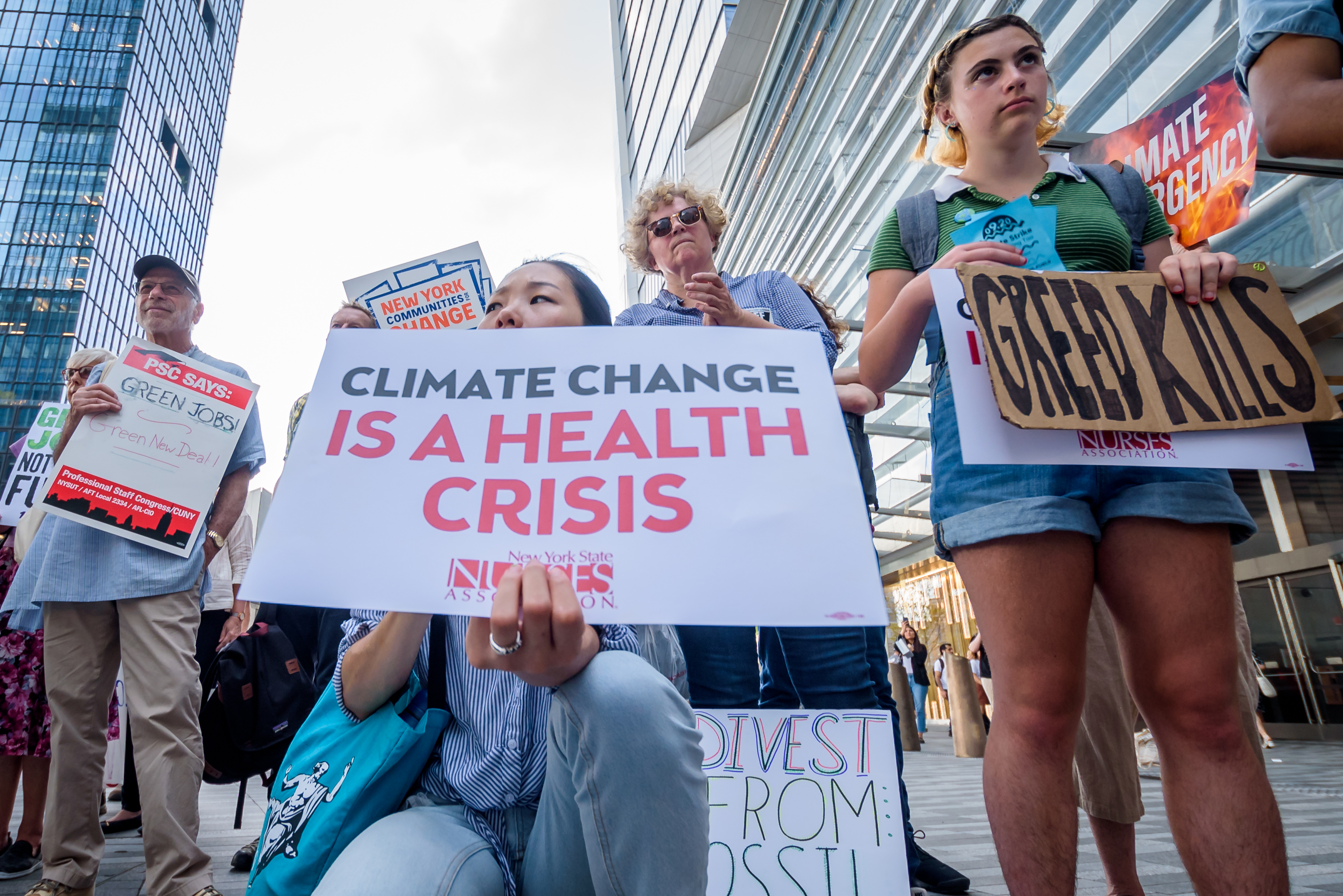 Hundreds of climate activists gathered outside the CNN