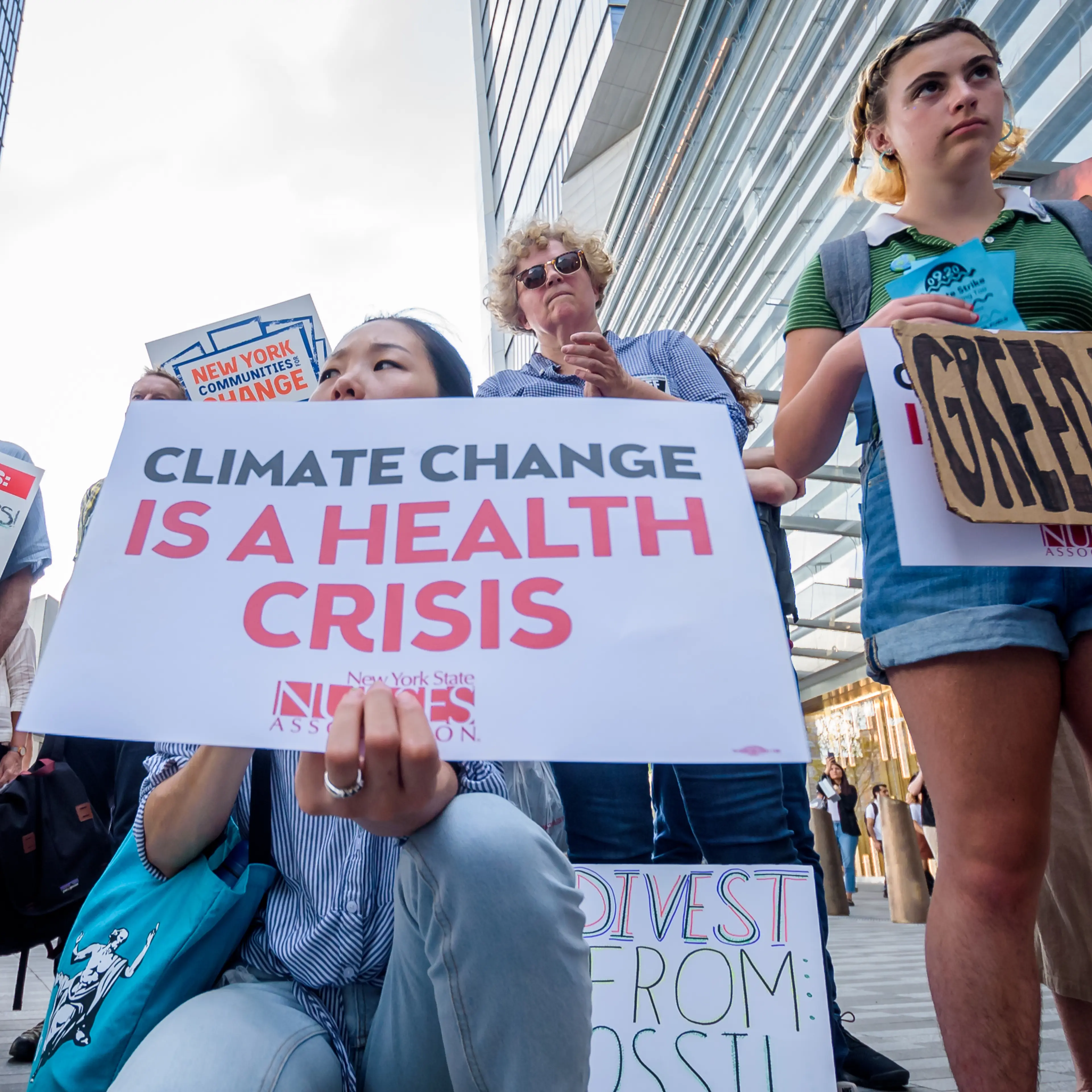 Hundreds of climate activists gathered outside the CNN