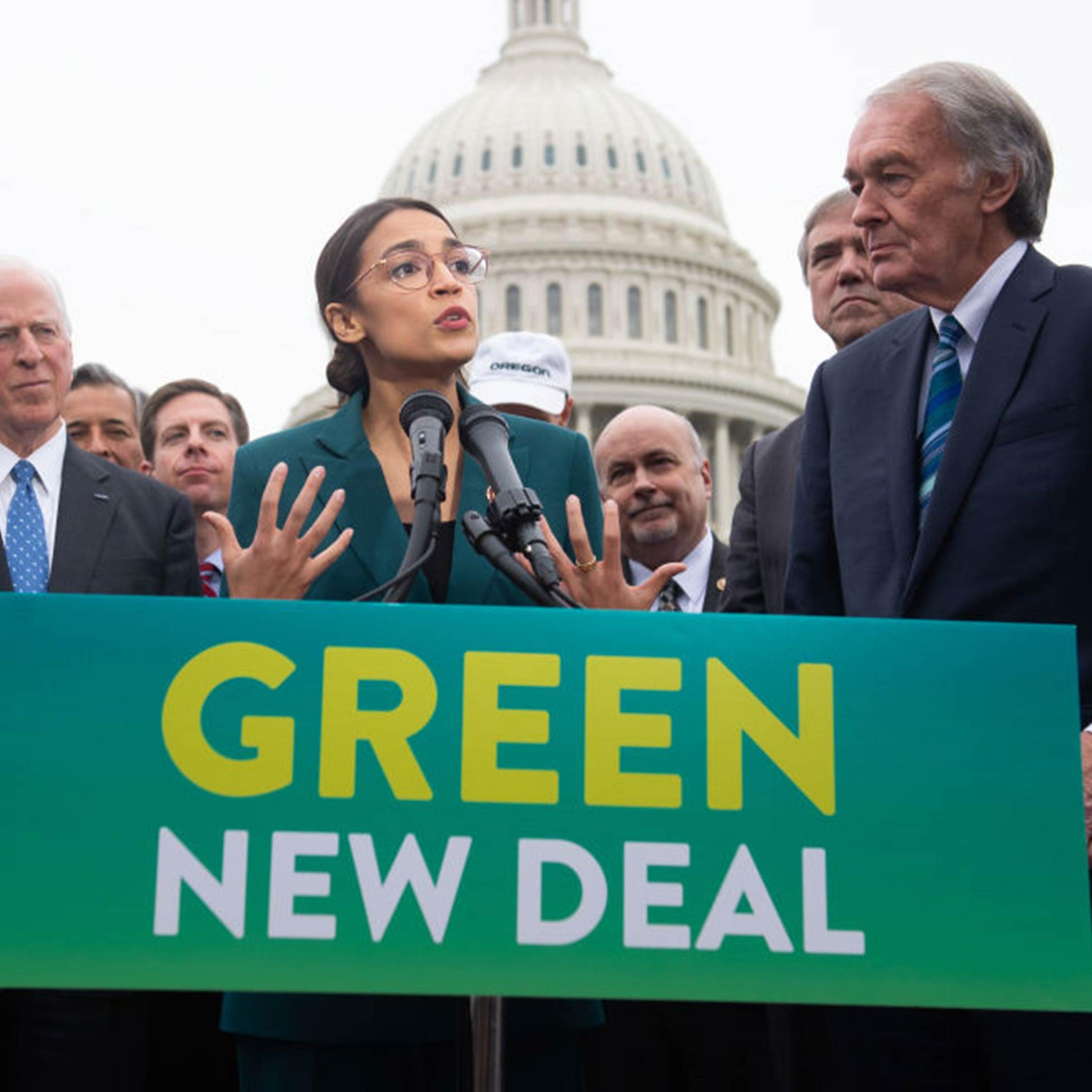 U.S. Representative Alexandria Ocasio-Cortez, Democrat of New York, and U.S. Senator Ed Markey (R), Democrat of Massachusetts, speak during a press conference to announce Green New Deal legislation to promote clean energy programs outside the U.S. Capitol in Washington, DC, on Feb. 7, 2019.