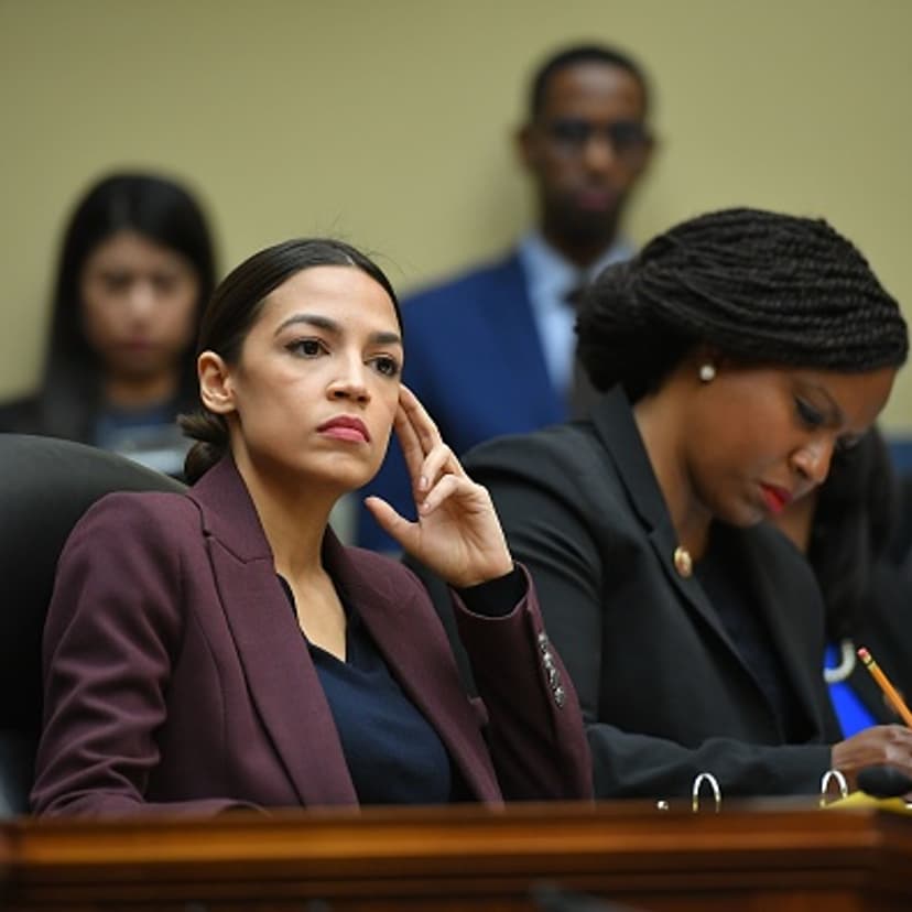 US Congresswoman Alexandria Ocasio-Cortez(D-NY) listens as Michael Cohen, attorney for President Trump, testifies