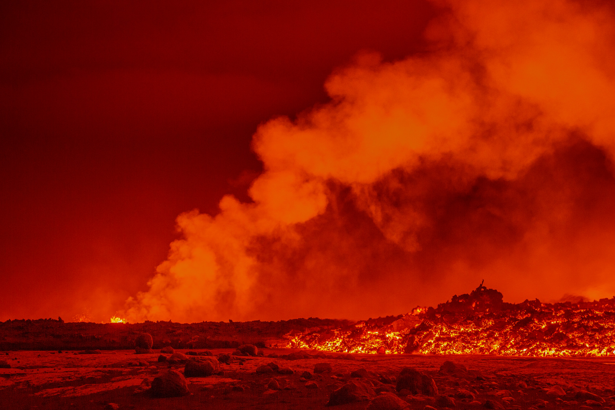 Glowing lava flows from an eruption at the Holuhraun lava field near Bardarbunga. Sept. 2.