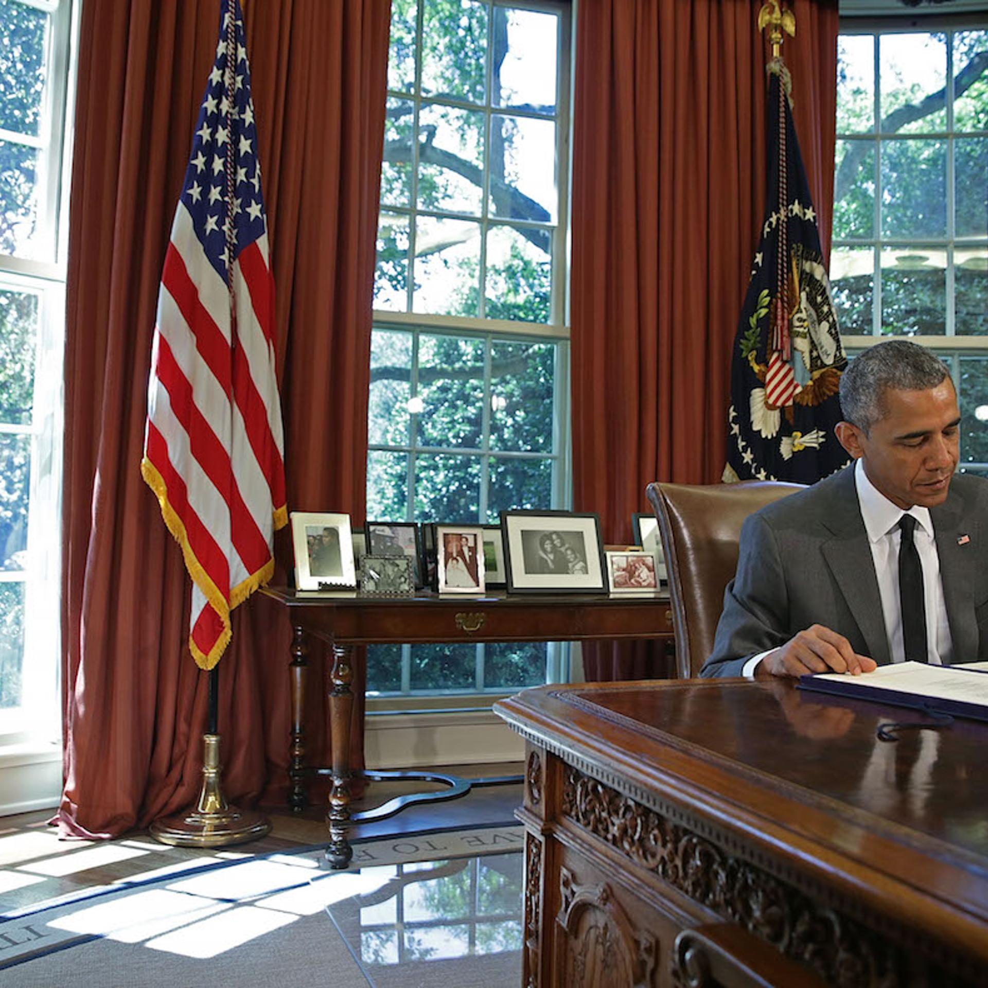 President Obama Signs Bill In Oval Office