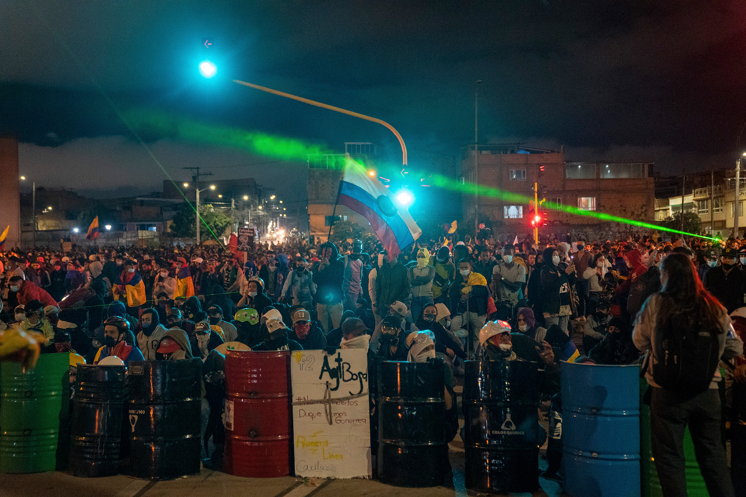Demonstrators gather on a street in Bogota on May 12. Demonstrations that began two weeks ago as anger over pandemic-related tax reforms have intensified and spread, turning into a collective howl of outrage over abuses by the national police force.