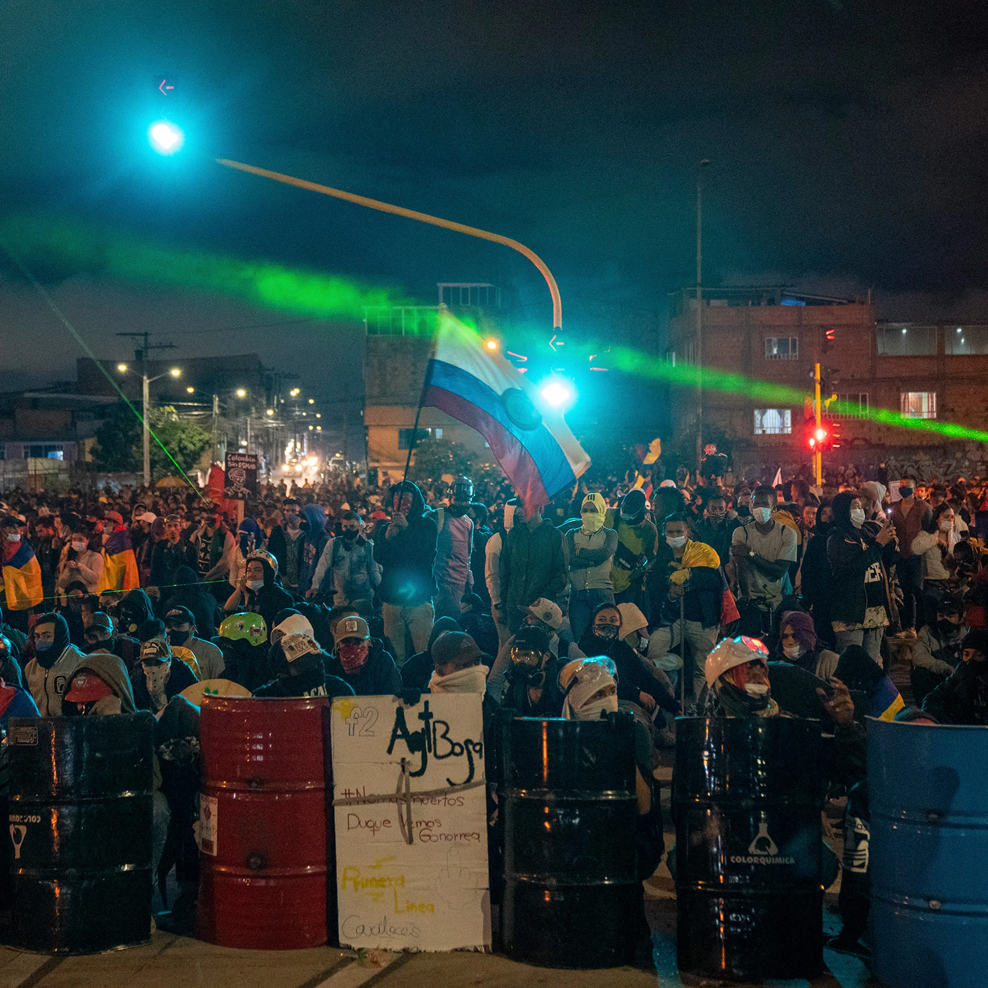 Demonstrators gather on a street in Bogota on May 12. Demonstrations that began two weeks ago as anger over pandemic-related tax reforms have intensified and spread, turning into a collective howl of outrage over abuses by the national police force.