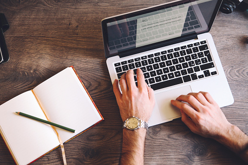 notebook-laptop-man-hands-typing