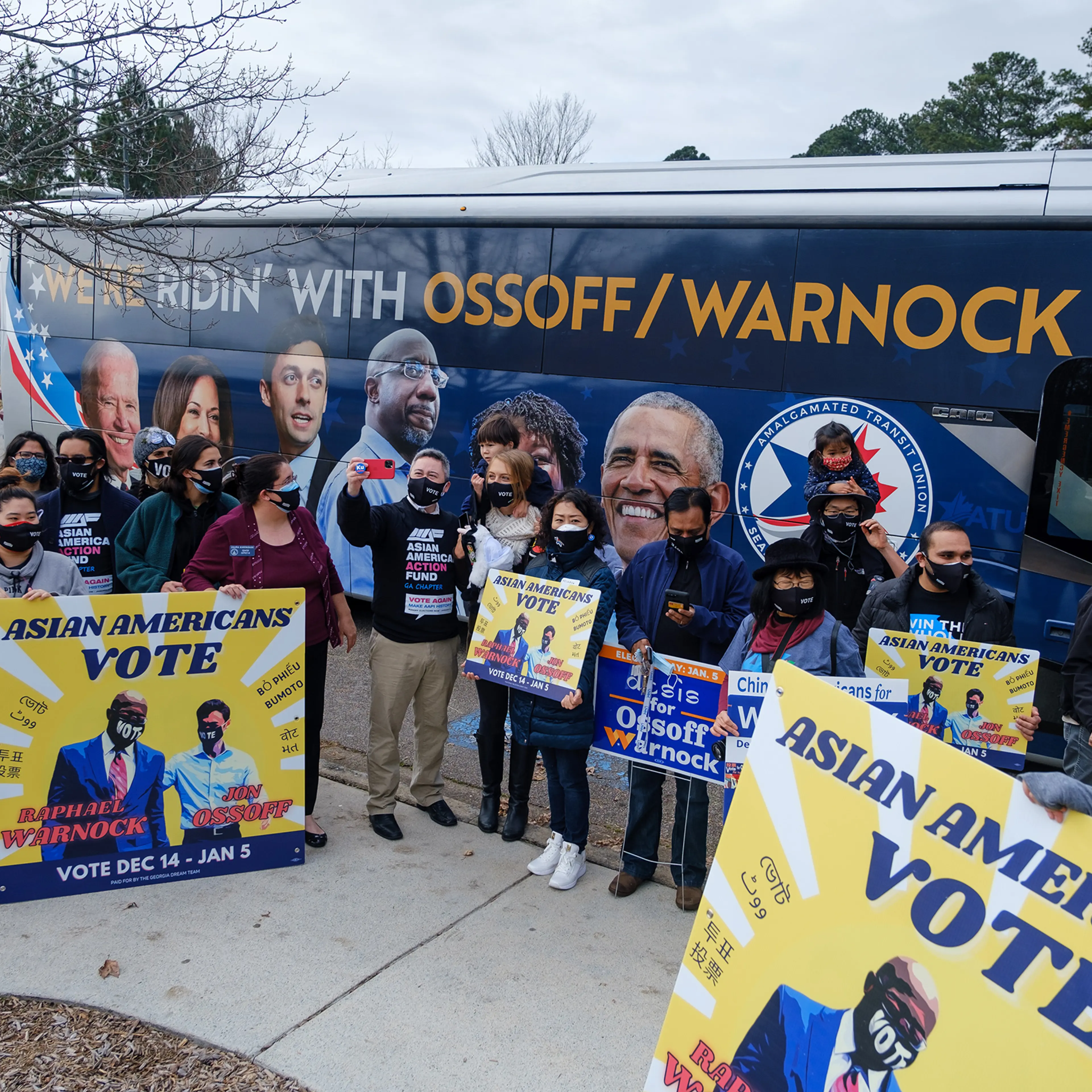 Supporters of Democratic senate candidates Rev. Raphael Warnock and Jon Ossoff gather at Shorty Howell Park in Duluth, Georgia on Dec. 20 for a "K-Pop Dance Rally" early voting event. The event was organized by the Georgia chapter of the Asian American A