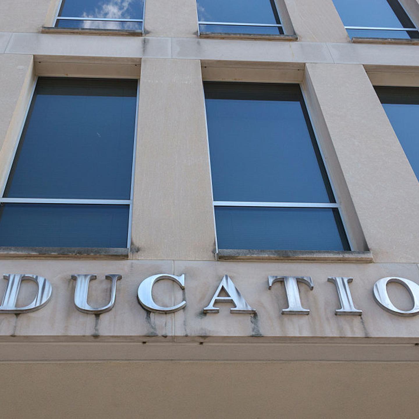 A sign is displayed outside of the Lyndon Baines Johnson Department of Education building in Washington, D.C. on May 18, 2025.