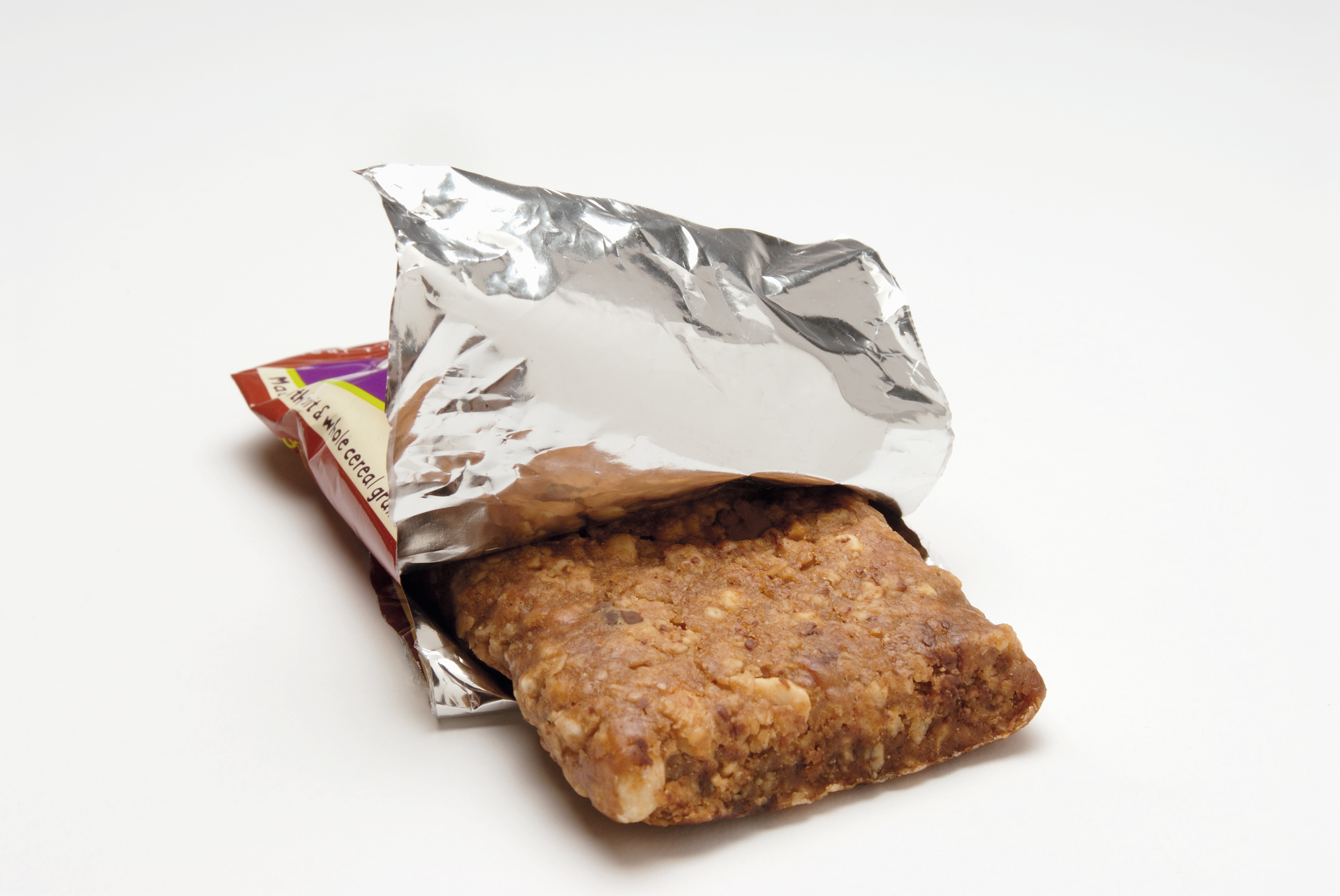 Muesli bar in opened packaging