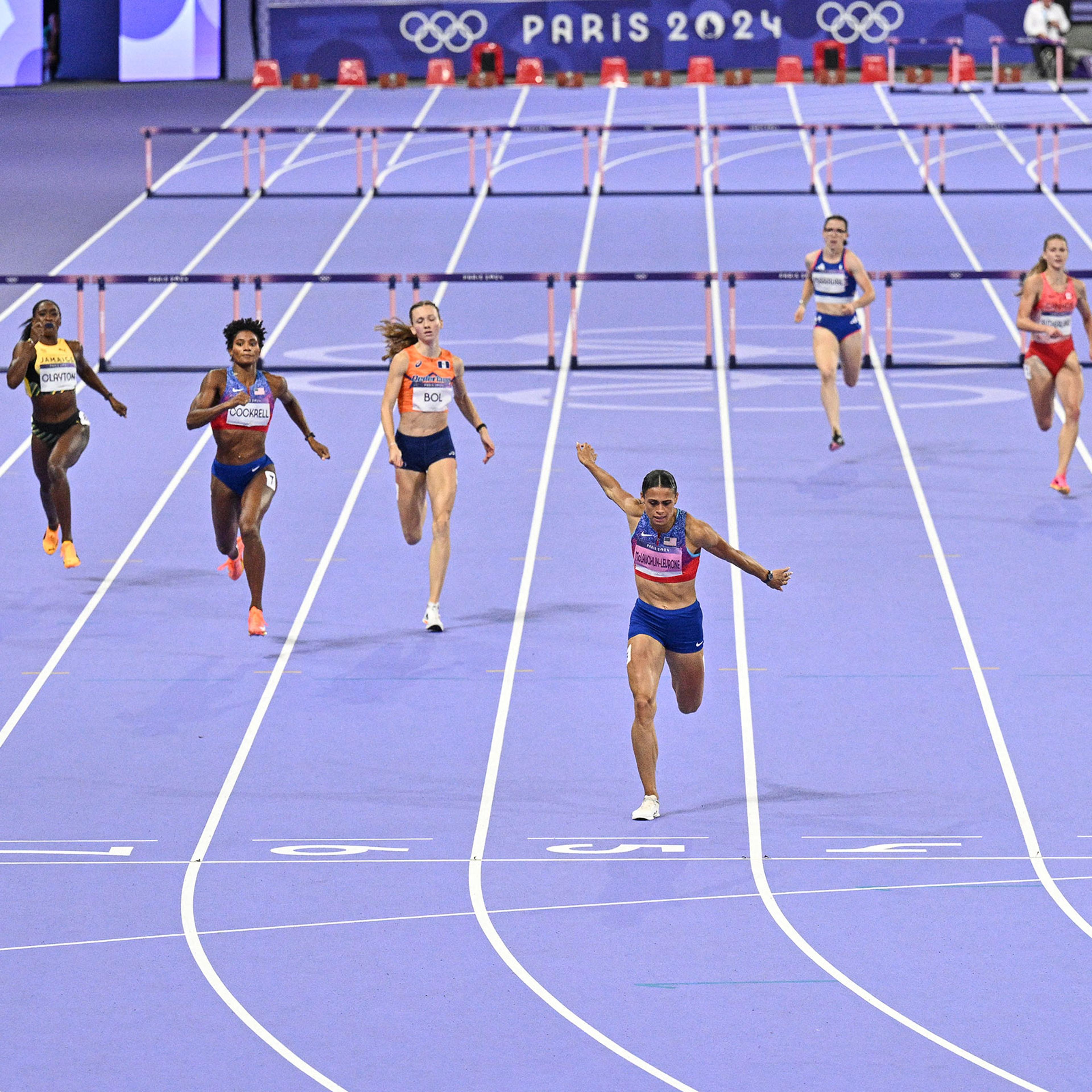 US' Sydney Mclaughlin-Levrone crosses the finish line to win the women's 400m hurdles final of the athletics event at the Paris 2024 Olympic Games on Aug. 8, 2024.