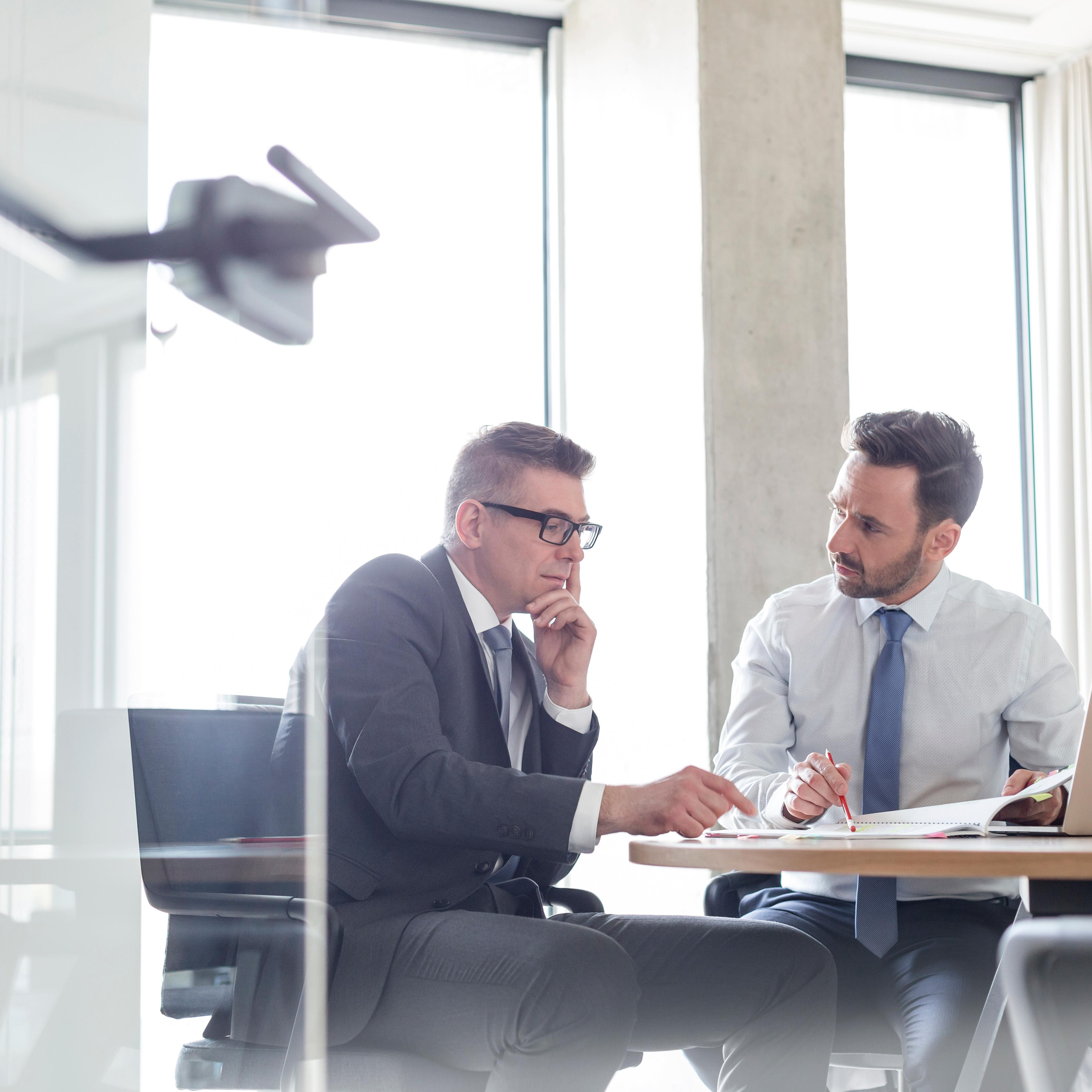 two-business-people-talking
