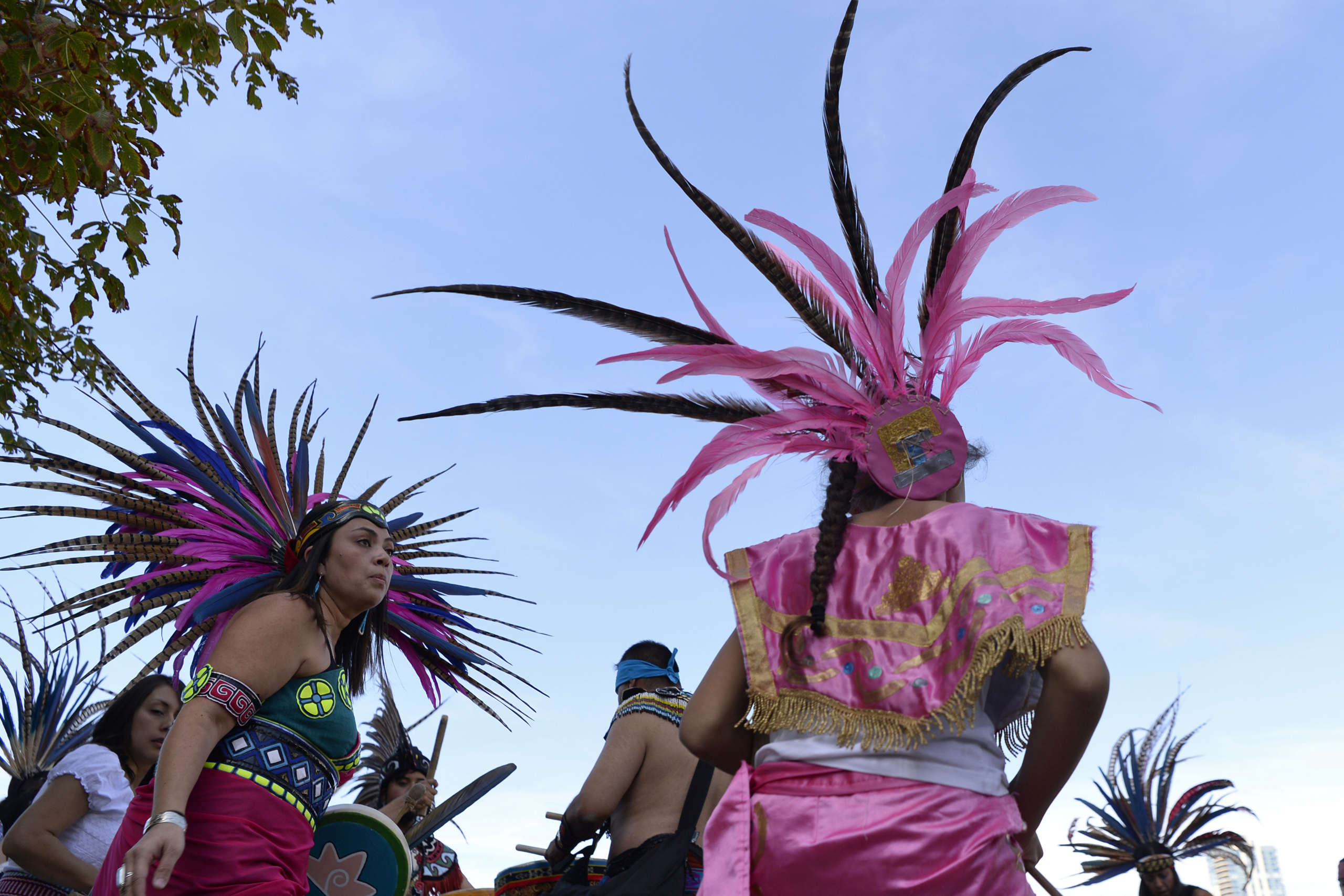 Members of Groupo Tlaloc and Groupo Xochitl dance on West Colfax Ave in Denver, Colorado during the Four Directions All Nations March and Rally on Oct. 08, 2016.