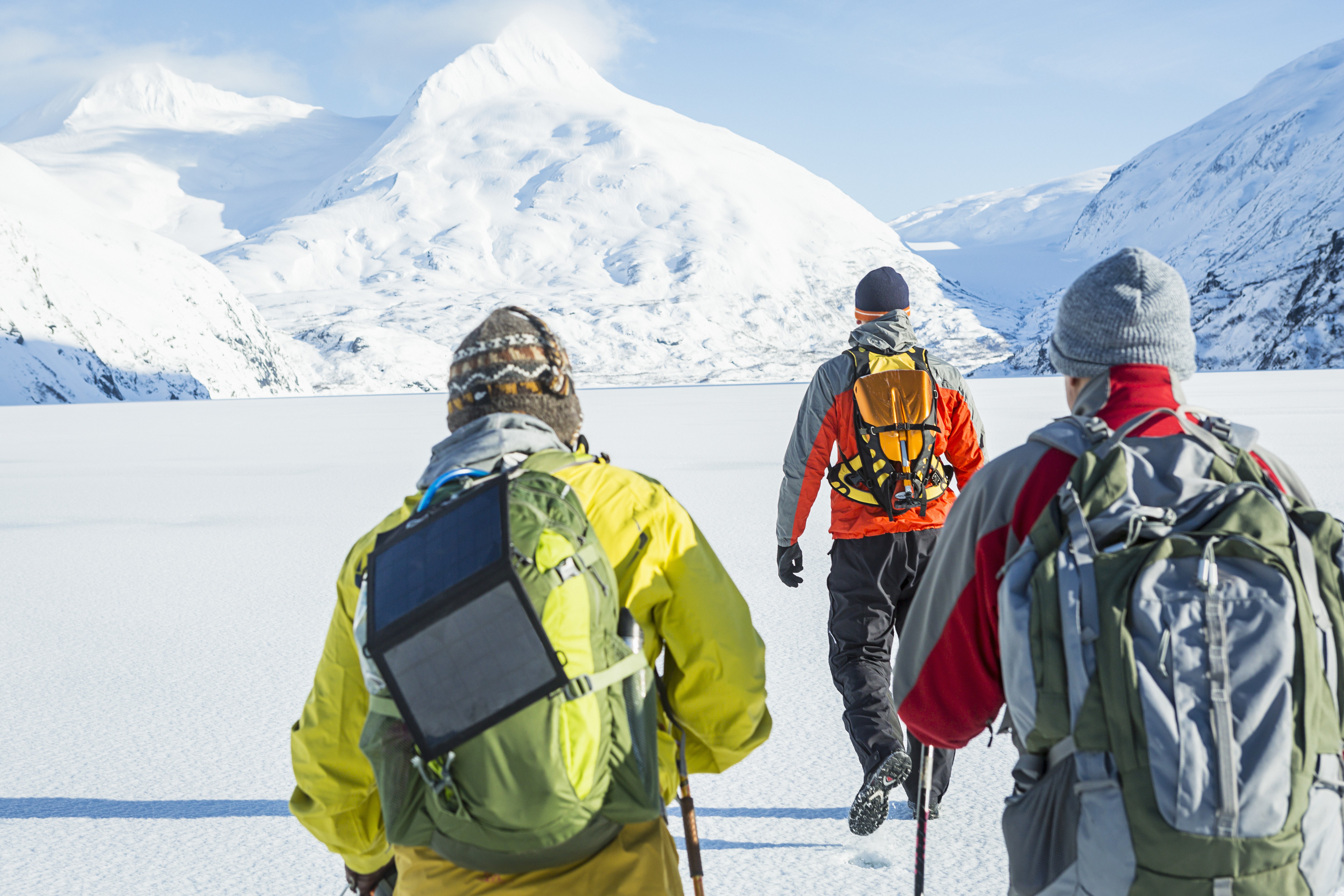 male-friends-hiking-mountain-winter
