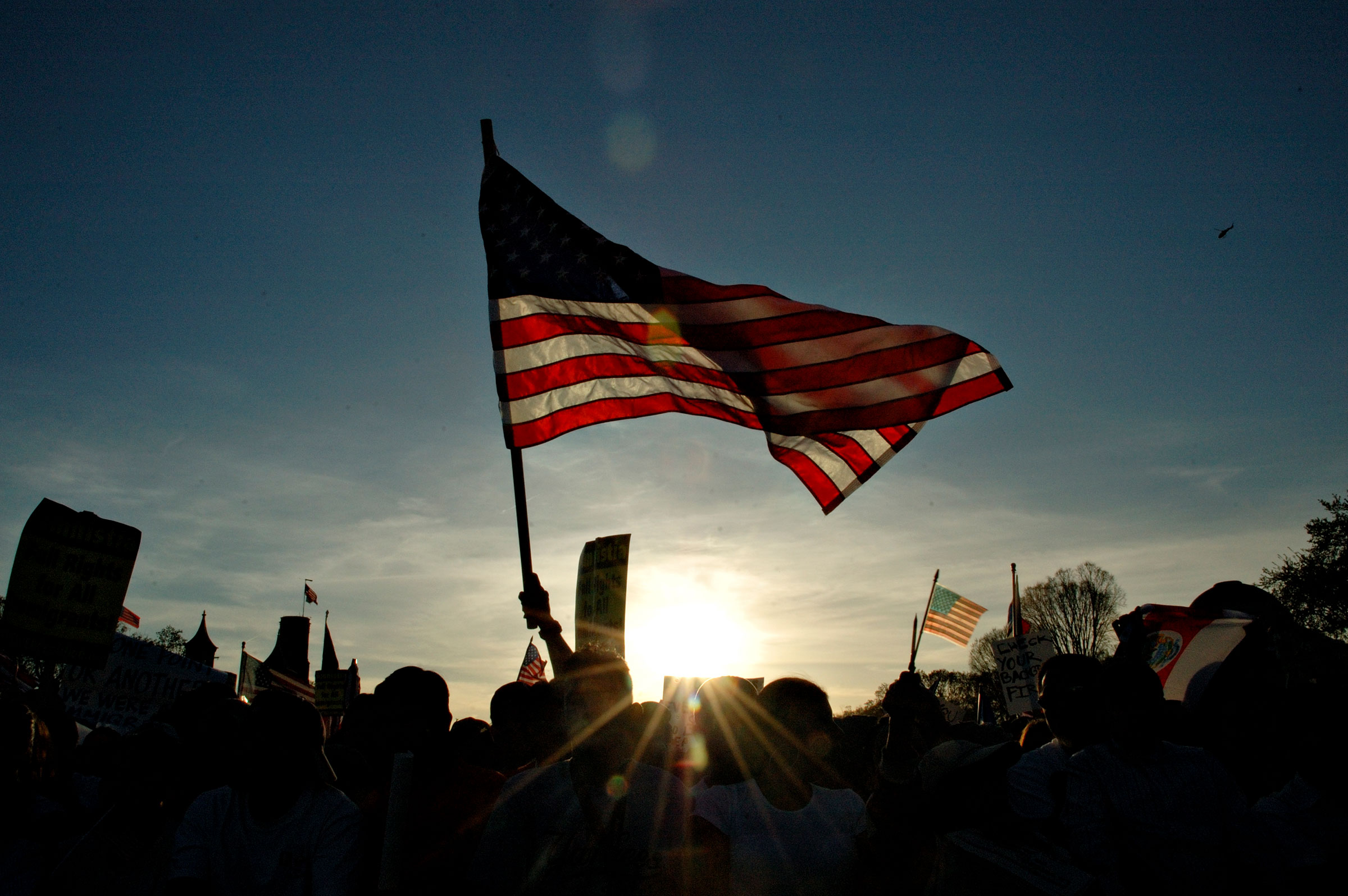 Demonstrators take part in the National Day of Action for Immigrant Justice, or La Marcha, April 10, 2006 on the National Mall in Washington, DC. Protests, marches and rallies were held across the United States today as the issue of immigration rights an