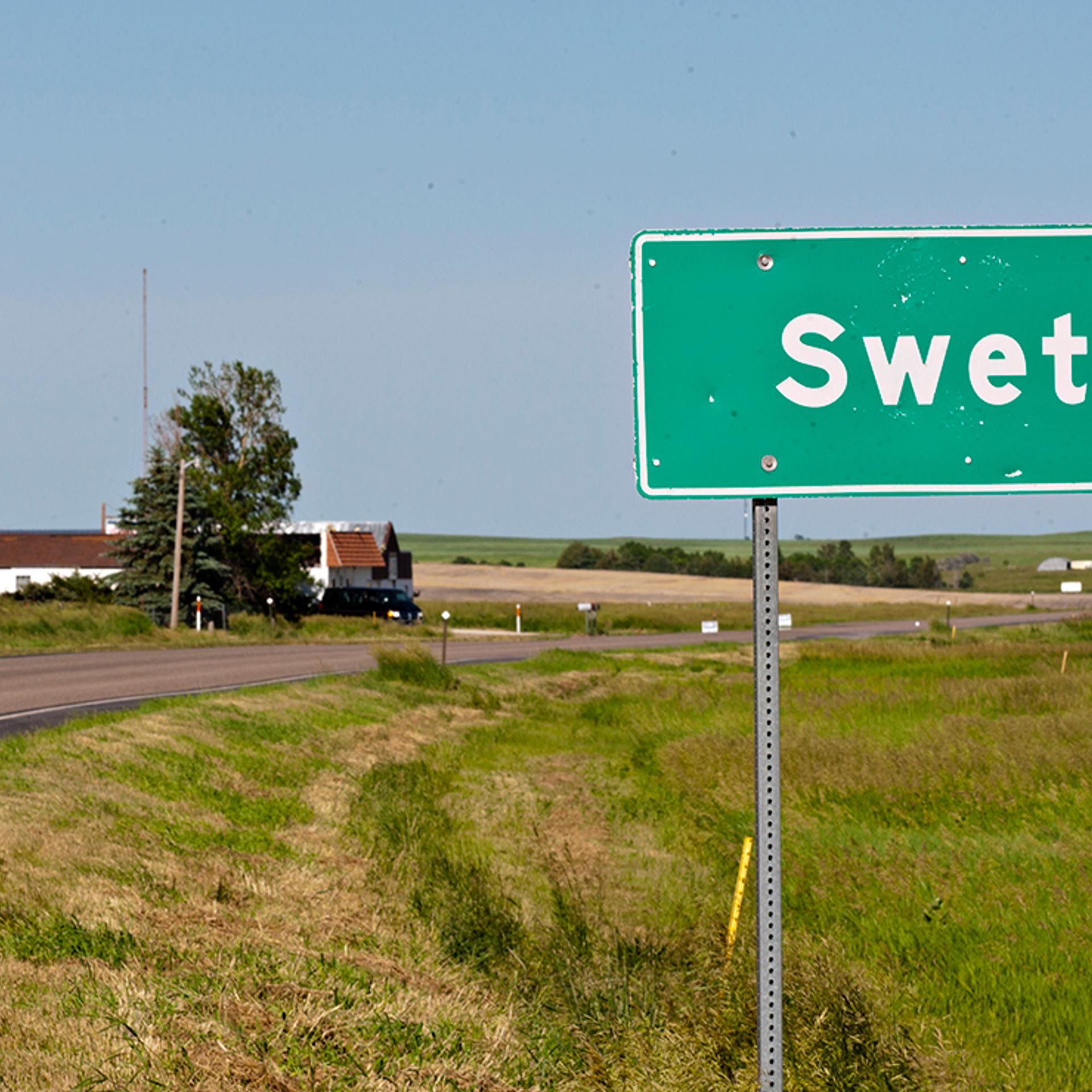 A road marker highlights Swett, S.D.'s small borders on June 26, 2014.