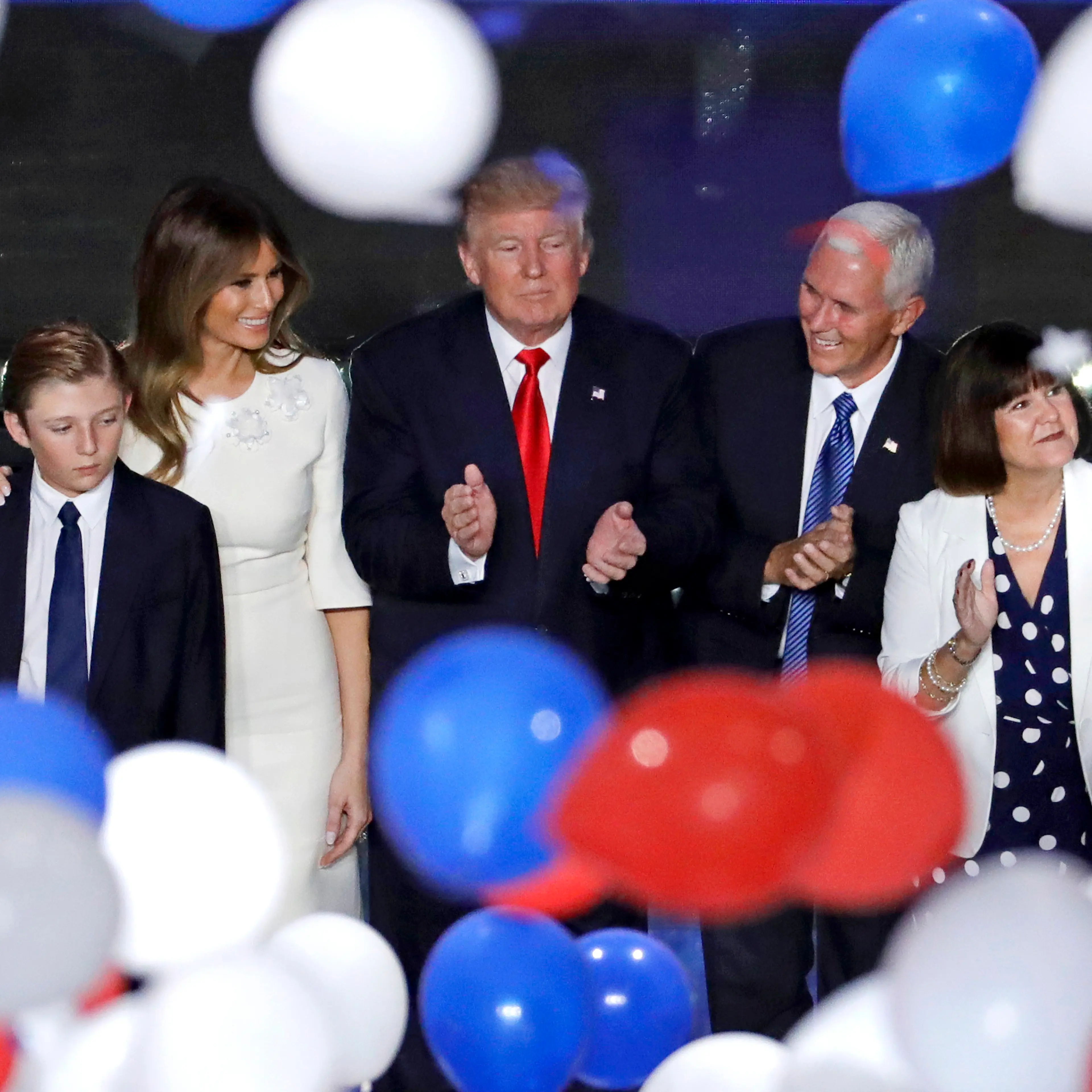 Republican presidential candidate Donald Trump, center, along with, from left, son Barron, wife Melania, Gov. Mike Pence of Indiana and Pence's wife Karen after Trump's address to delegates during the final day session of the Republican National Conventi