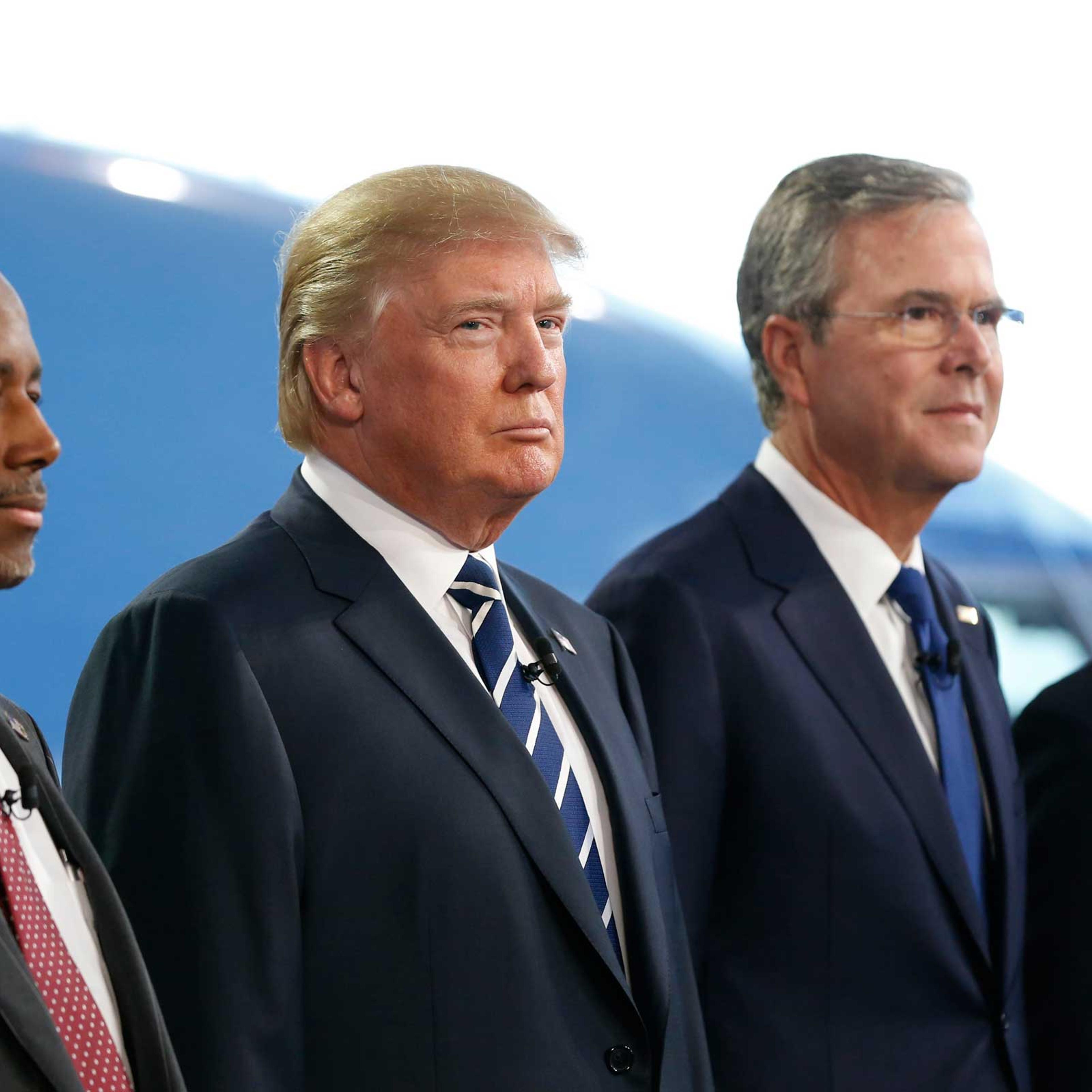Republican U.S. presidential candidates Carson,Trump, Bush and Walker pose before the start of the second official Republican presidential candidates debate of the 2016 U.S. presidential campaign at the Ronald Reagan Presidential Library in Simi Valley