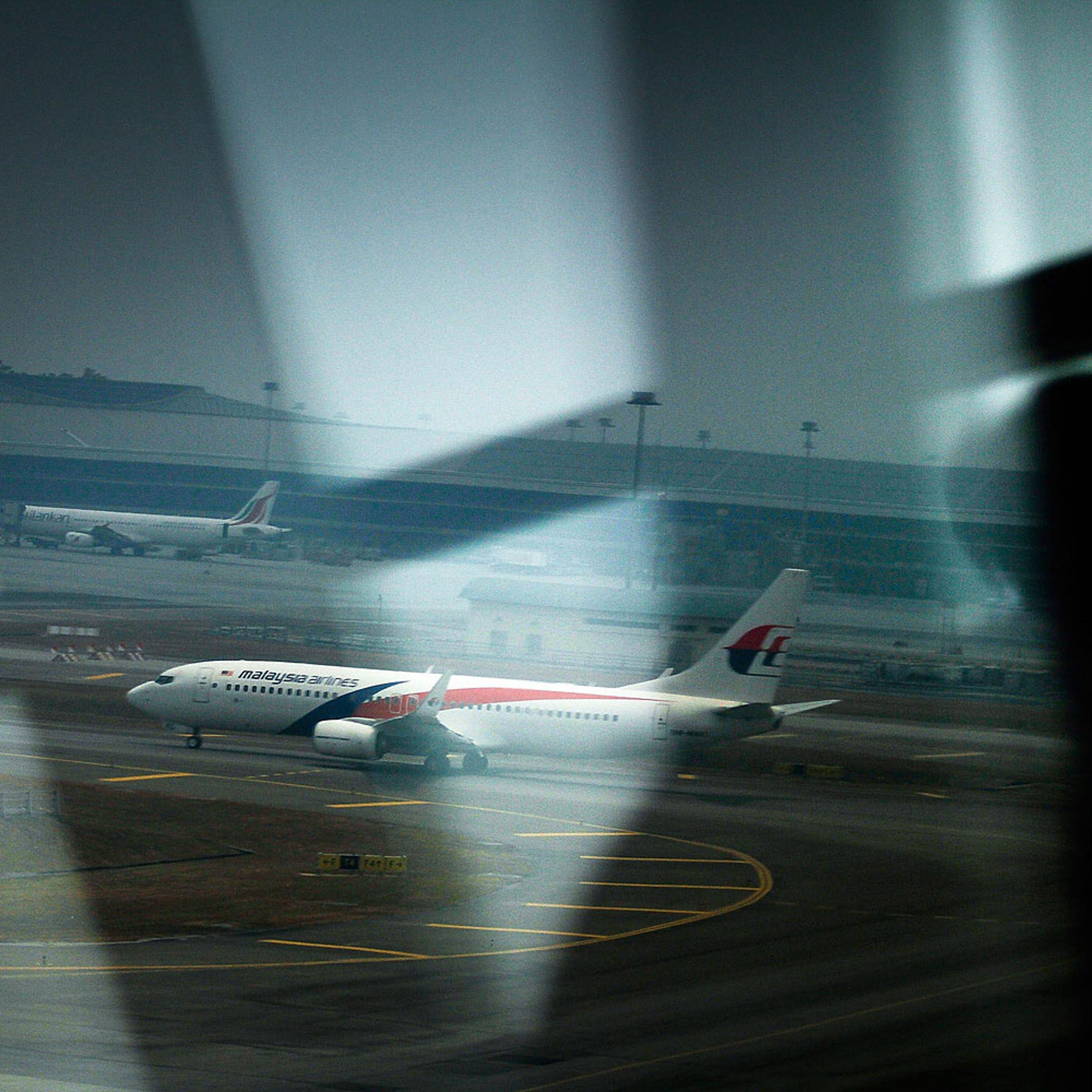 A Malaysian Airlines plane is seen on the tarmac at Kuala Lumpur International Airport on March 12, 2014 in Kuala Lumpur.