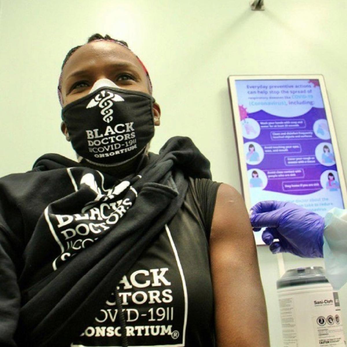 Dr. Ala Stanford receiving her COVID-19 vaccine. Stanford's vaccination was televised in order to promote the safety and efficacy of the shot.