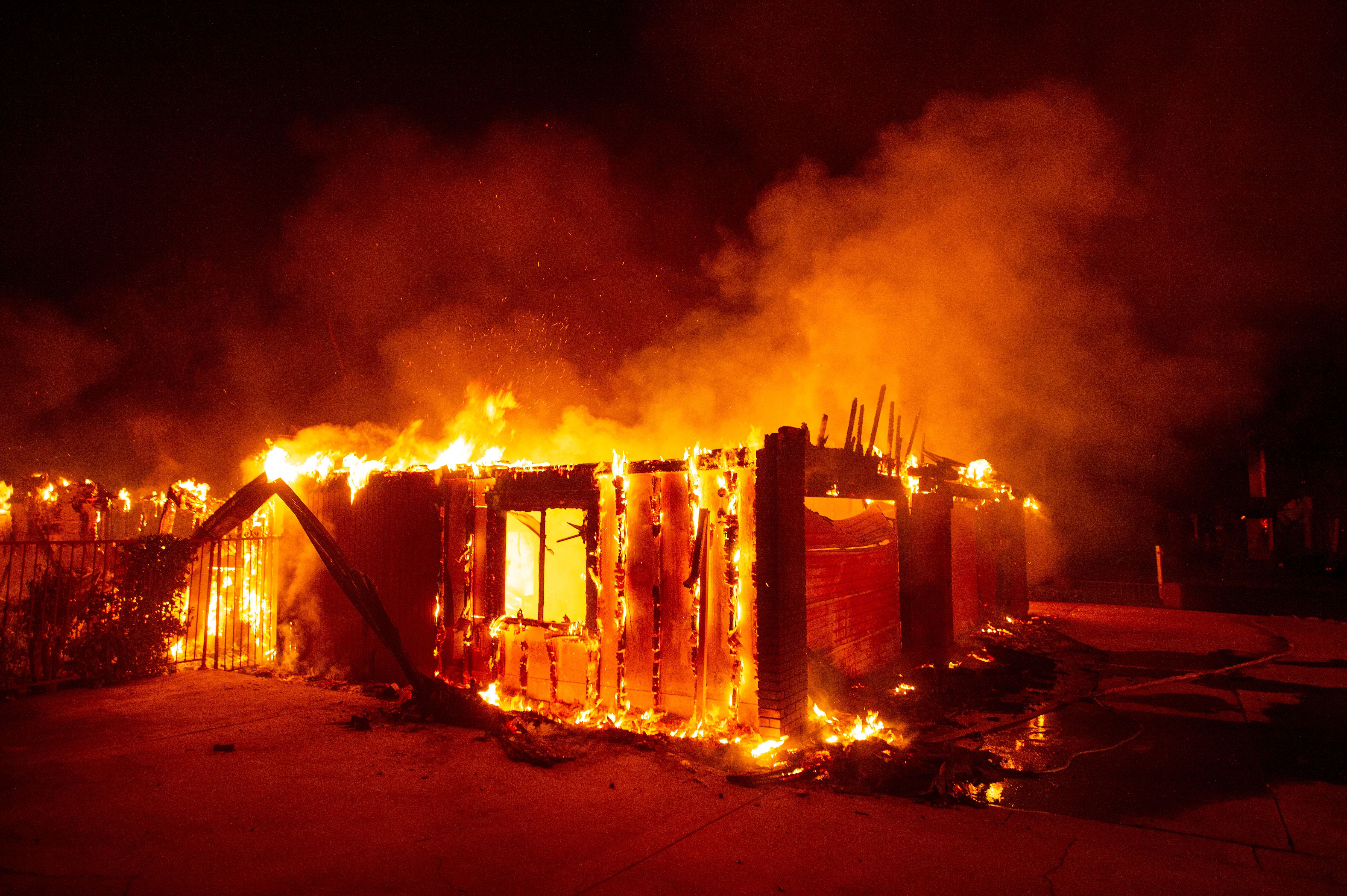 House engulfed in flames from Carr fire