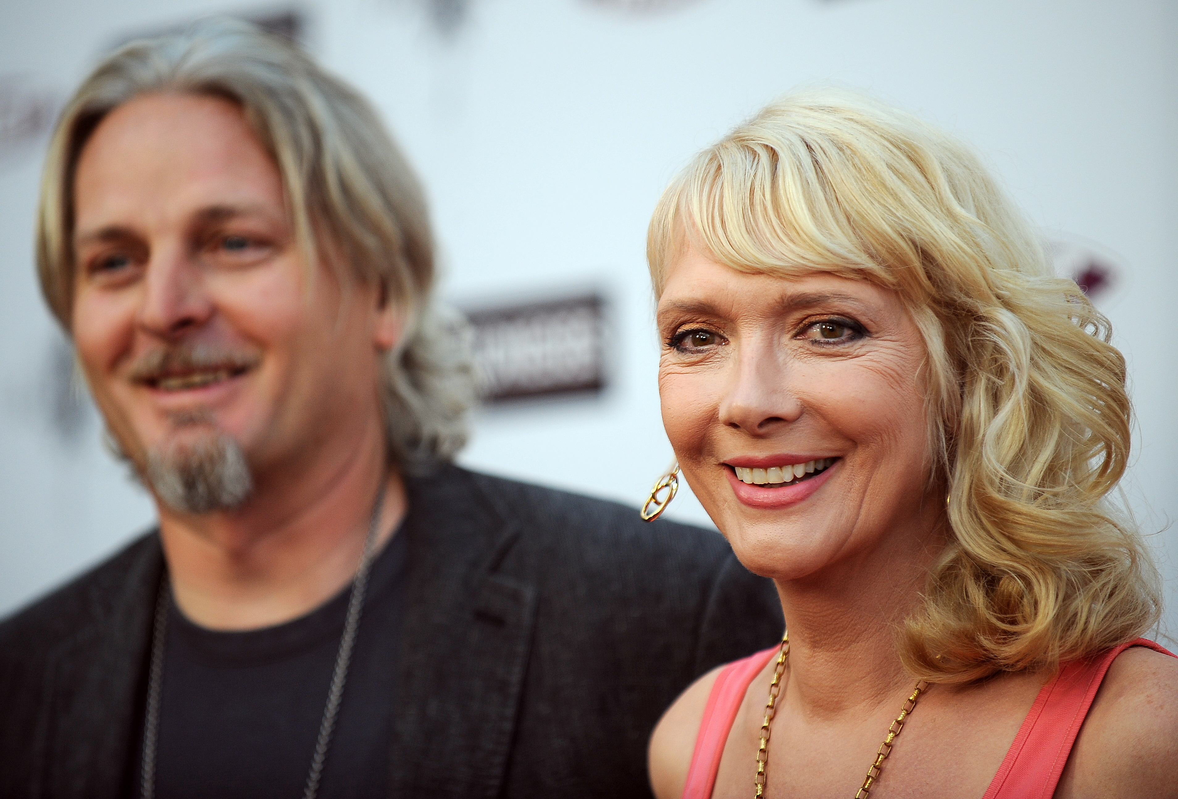 Actress Glenne Headly arrives with her h