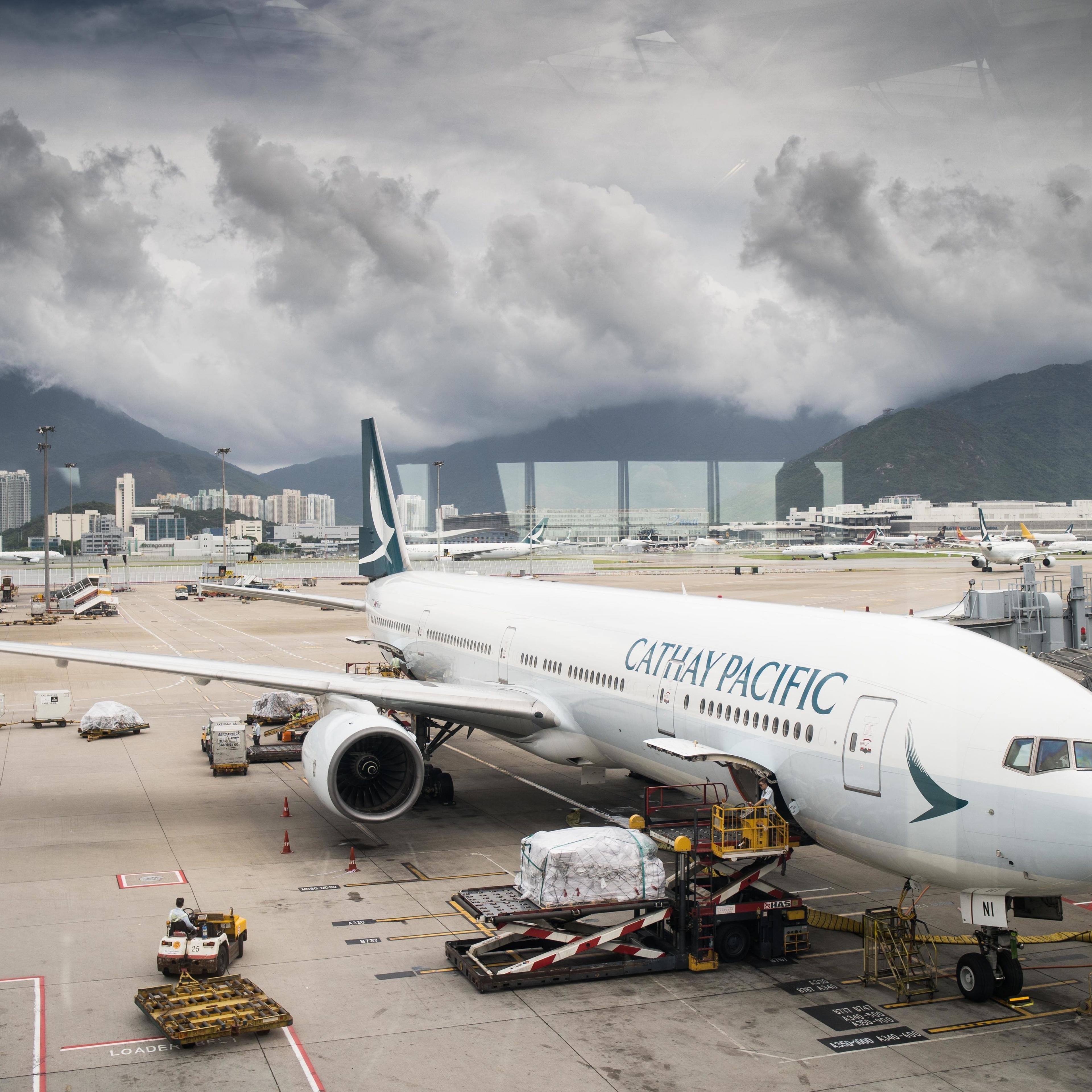 A Cathay Pacific Boeing 777-300 aircraft seen at the gate in