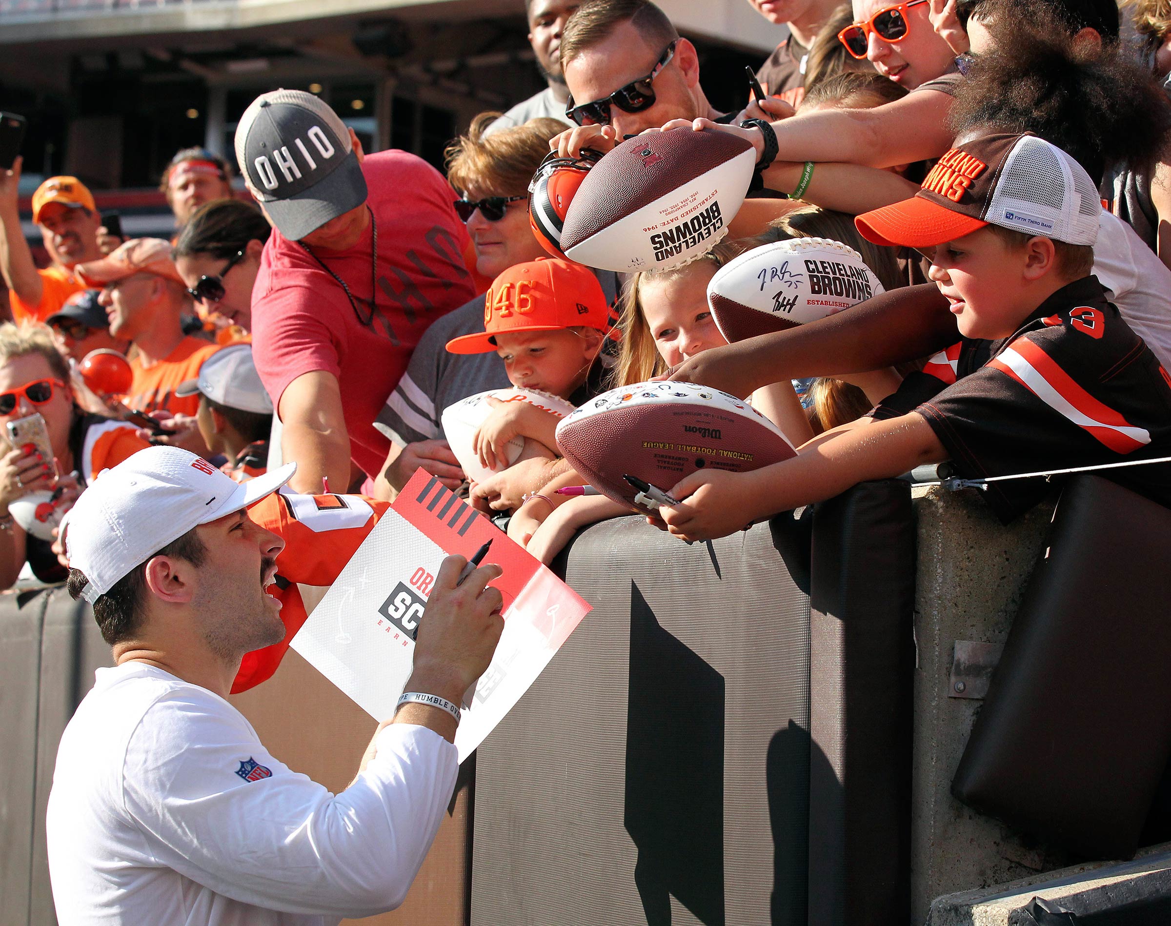 Fans clamor for Baker Mayfield, who set the NFL rookie record for TD passes in 2018, at a Browns scrimmage in August.
