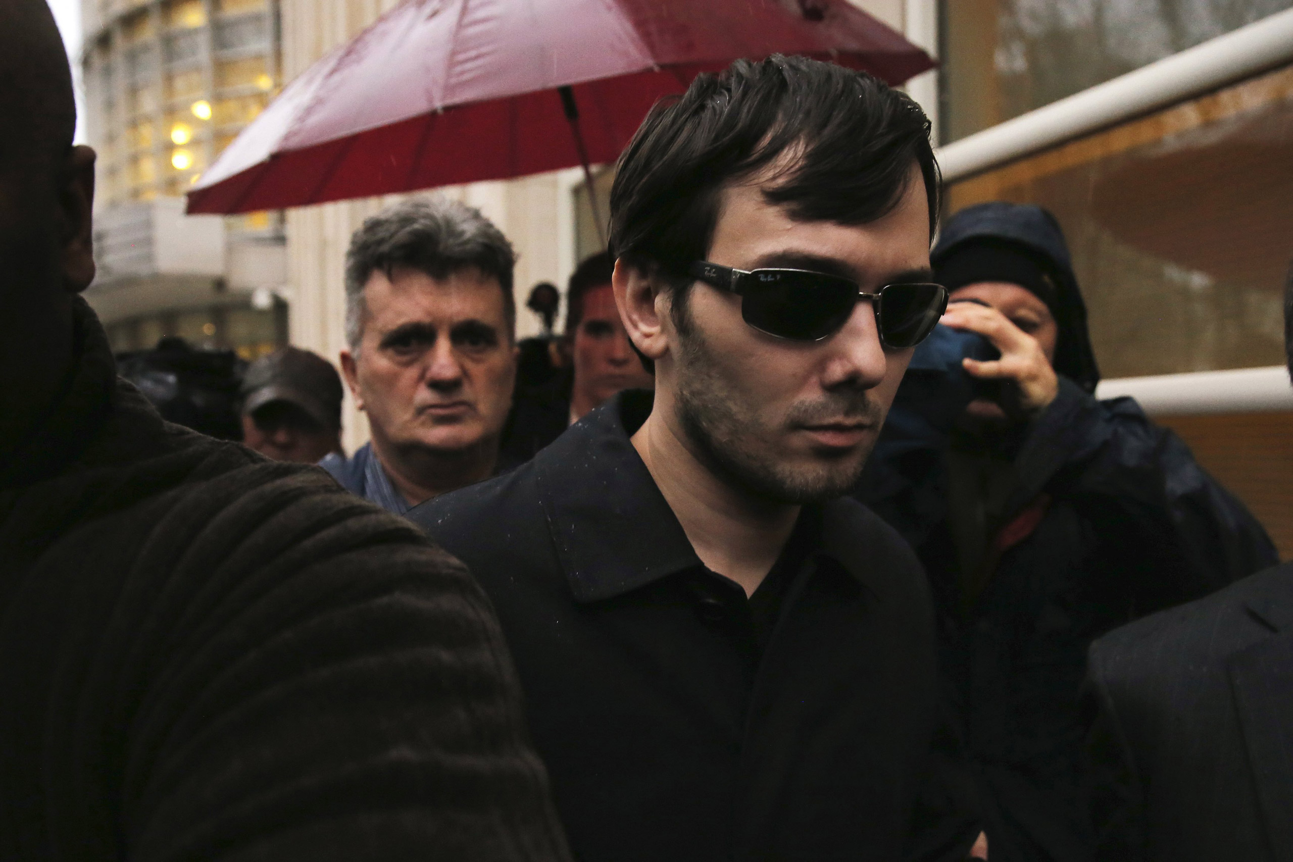 Martin Shkreli, chief executive officer of Turing Pharmaceuticals and KaloBios Pharmaceuticals Inc, departs U.S. Federal Court after an arraignment following his being charged in a federal indictment filed in Brooklyn relating to his management of hedge 