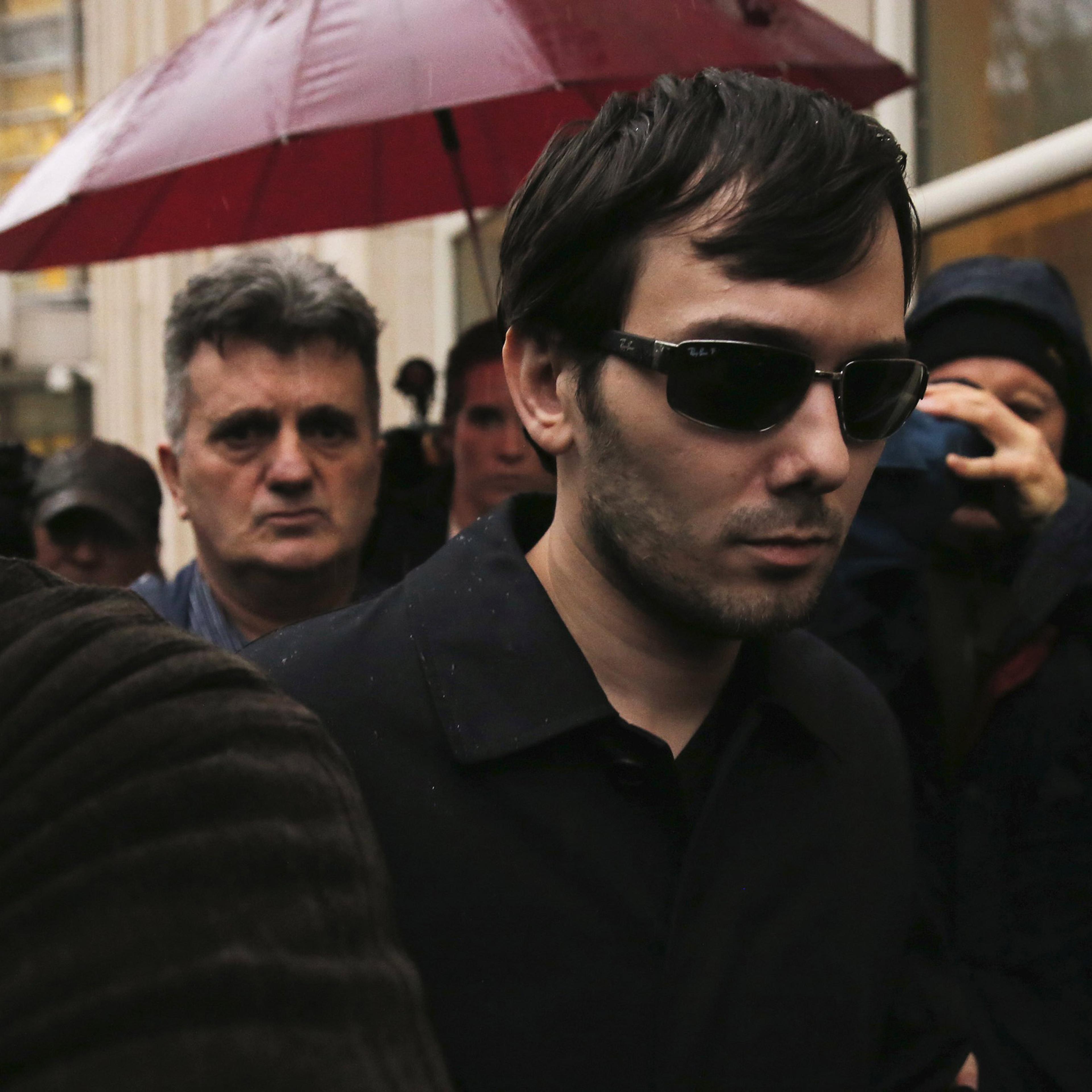 Martin Shkreli, chief executive officer of Turing Pharmaceuticals and KaloBios Pharmaceuticals Inc, departs U.S. Federal Court after an arraignment following his being charged in a federal indictment filed in Brooklyn relating to his management of hedge