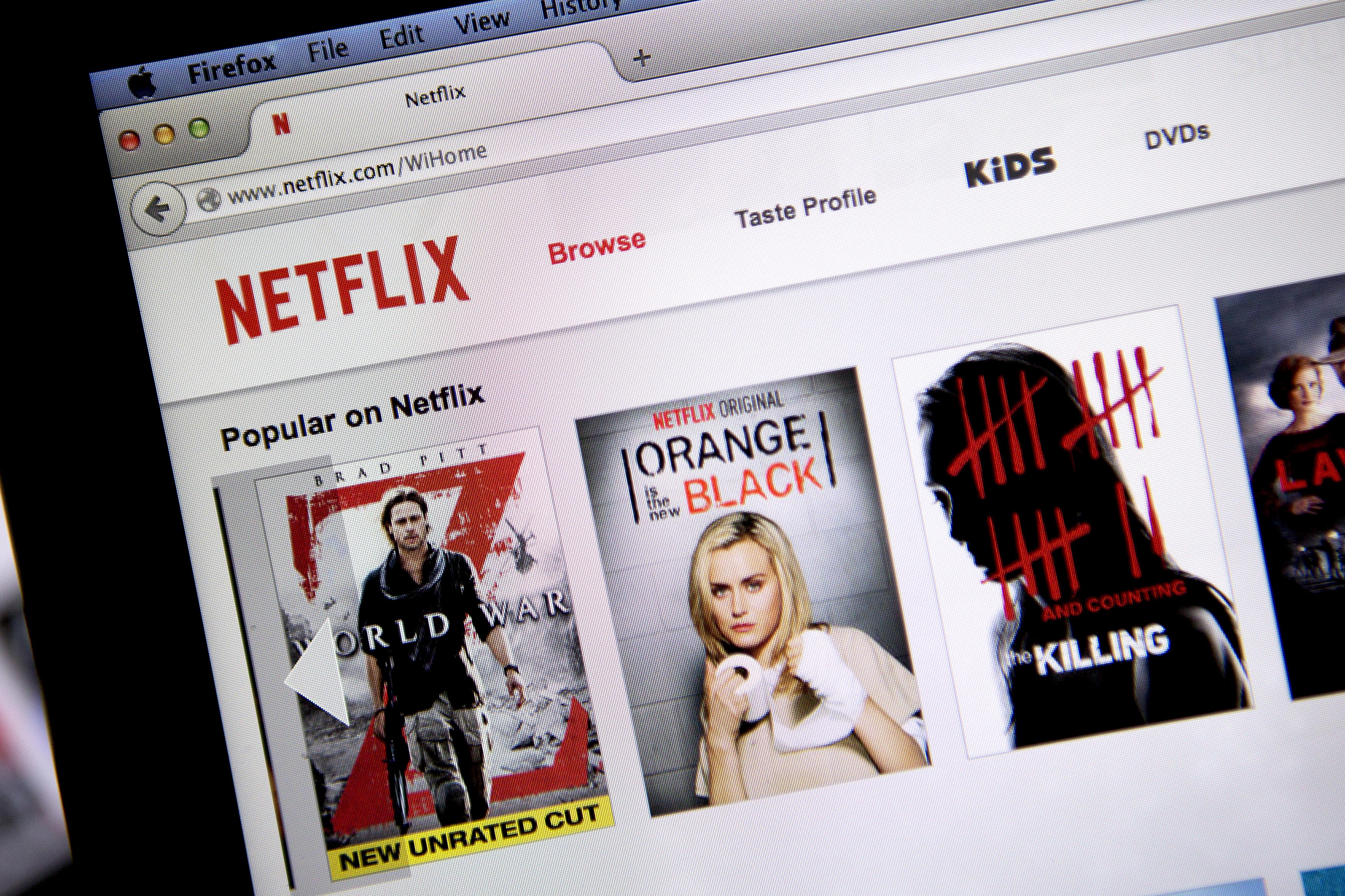 The Netflix Inc. website is displayed on a laptop computer.