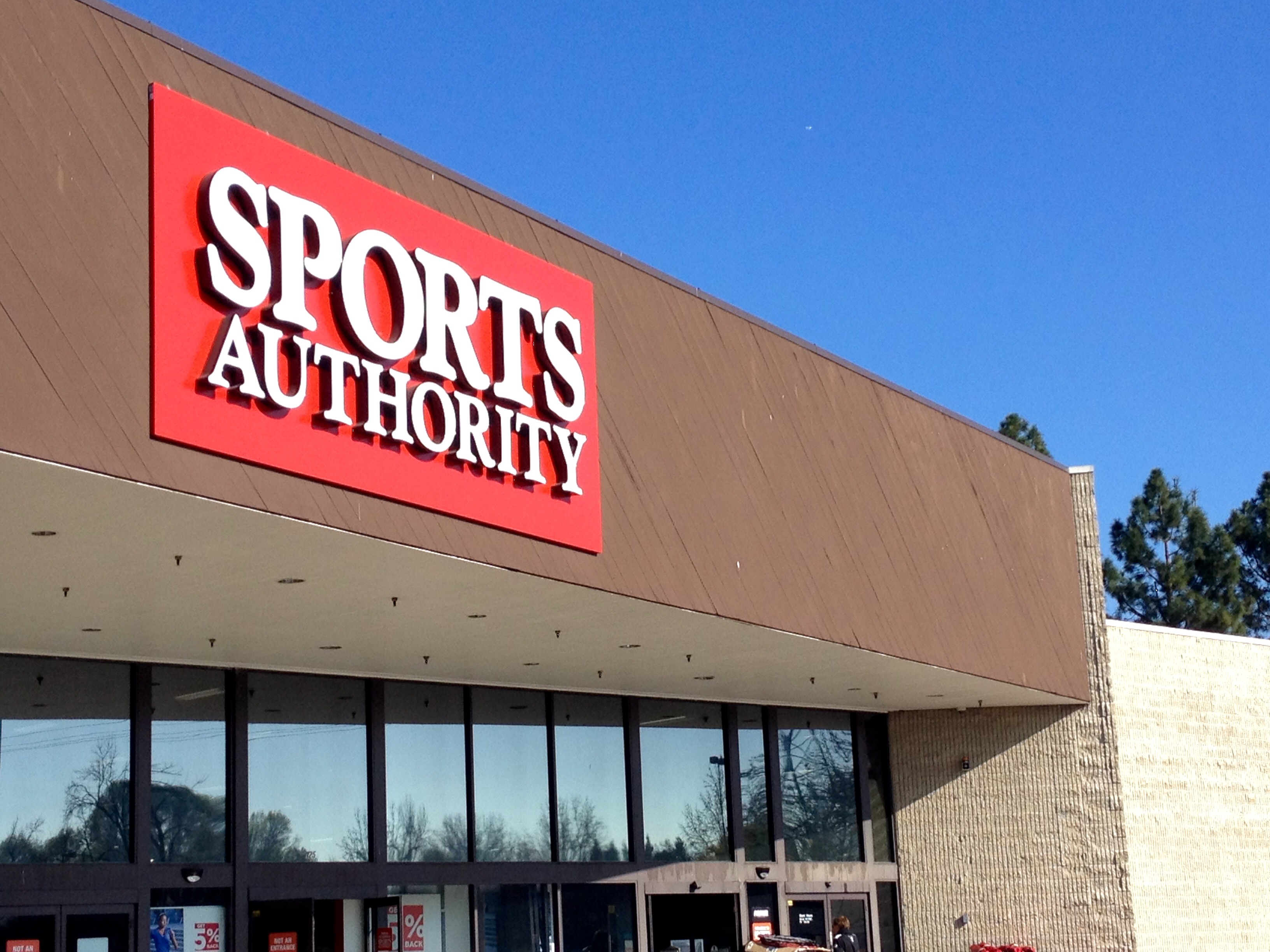 A sign hangs outside of a Sports Authority store in Sunnyvale, California.
