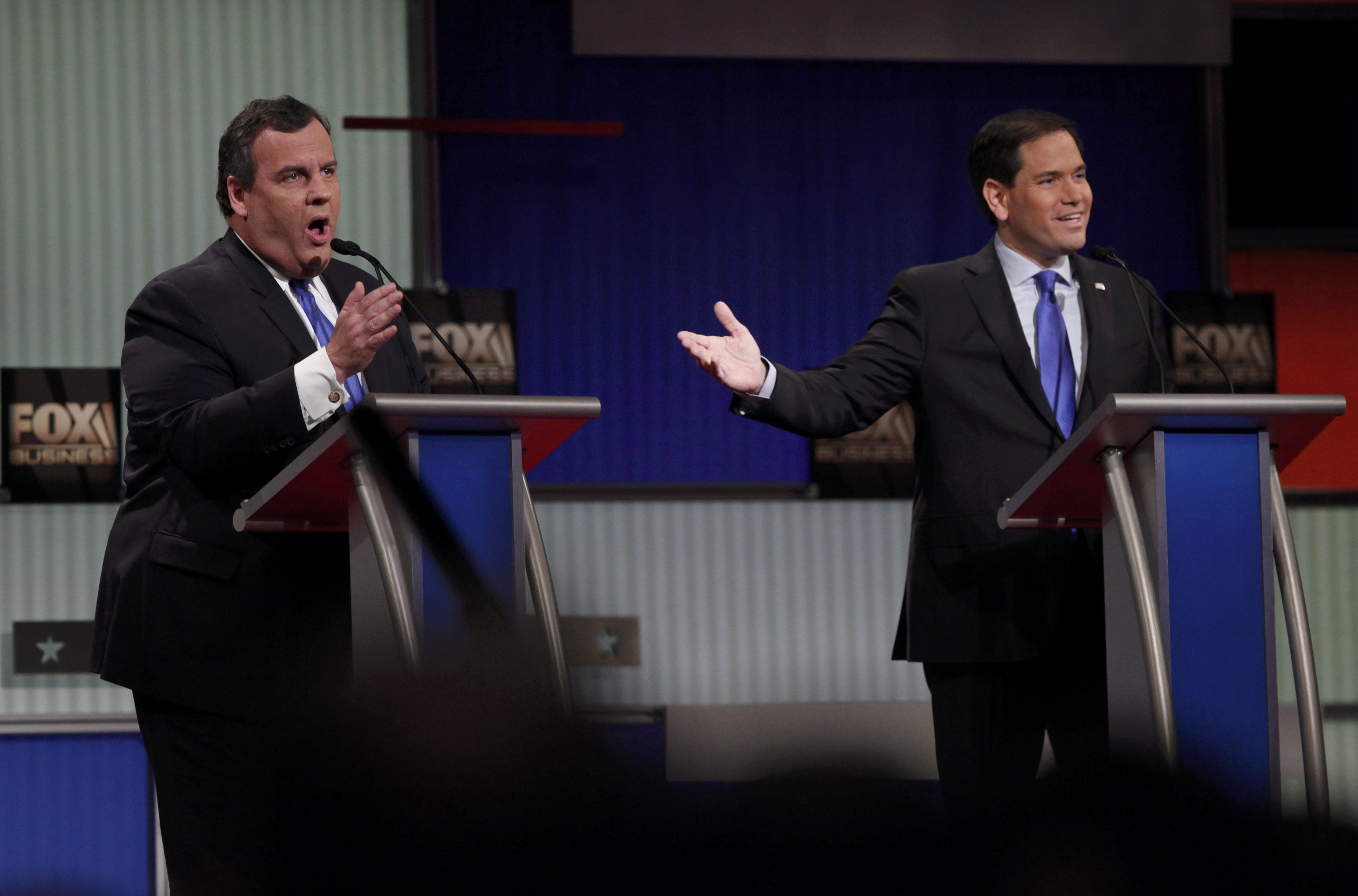 Republican U.S. presidential candidate Christie and Rubio speak simultaneously during the Fox Business Network Republican presidential candidates debate in North Charleston