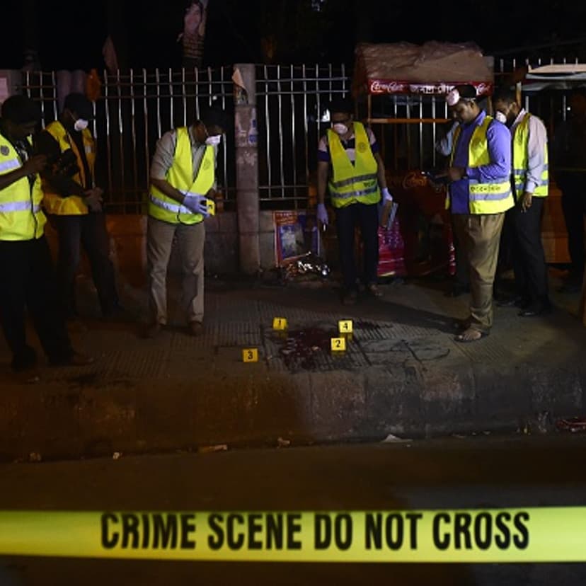 Police forensics investigate the scene where U.S. blogger of Bangladeshi origin was hacked to death by unidentified assailants in Dhaka on February 27, 2015.