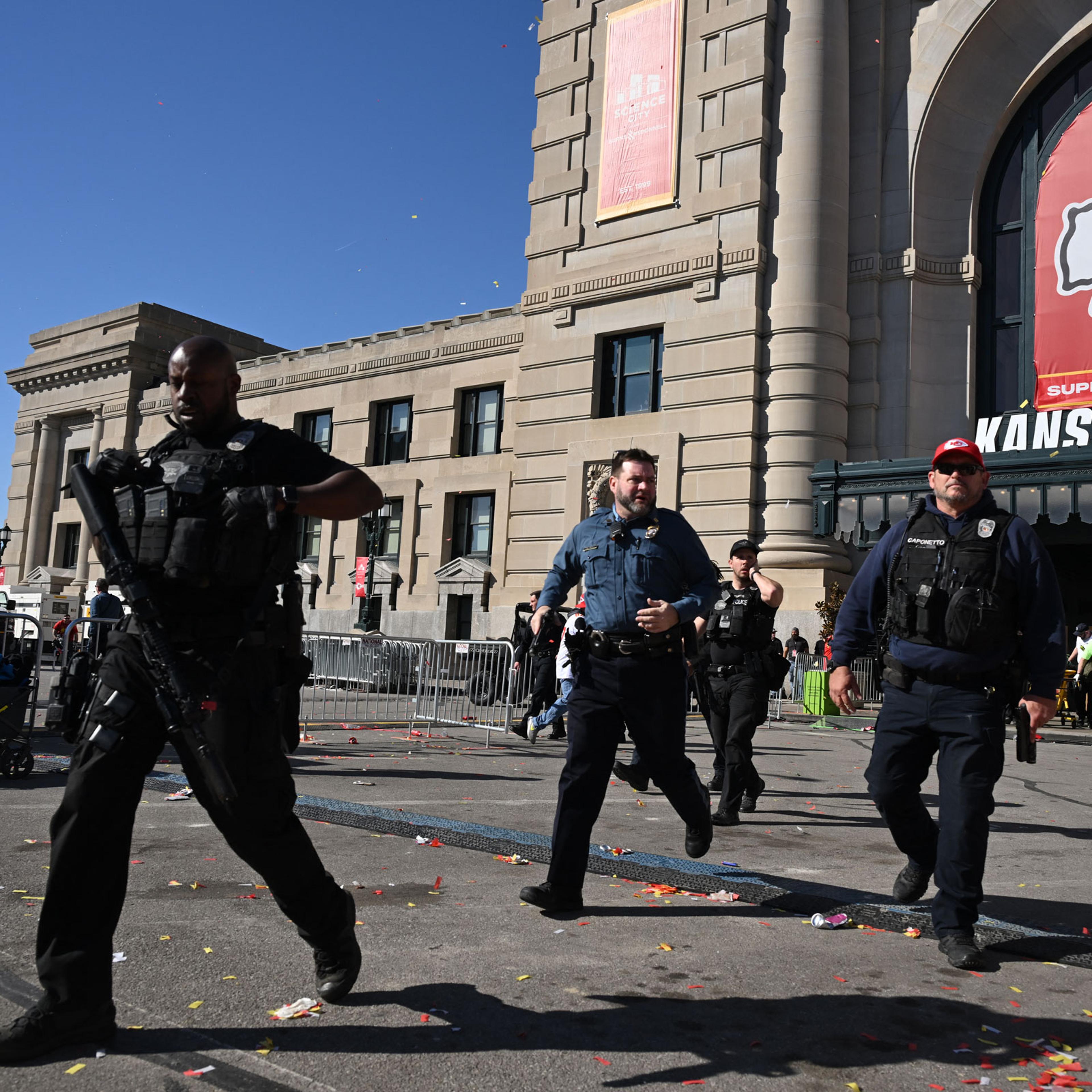 Police respond after shots were fired near the Kansas City Chiefs' Super Bowl LVIII victory parade in Kansas City, Mo., on Feb. 14, 2024.