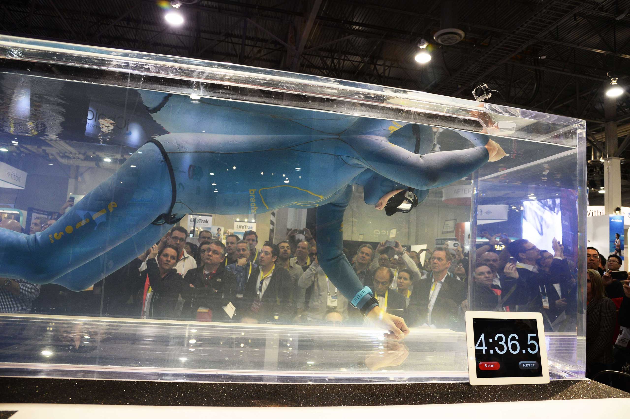 World freediving champion Stig Severinsen holds his breathe underwater for a total of 5 minutes, 35 secs to demonstrate the functionality and accuracy of the Masimo SET pulse oximetry device on Jan. 8, 2015.