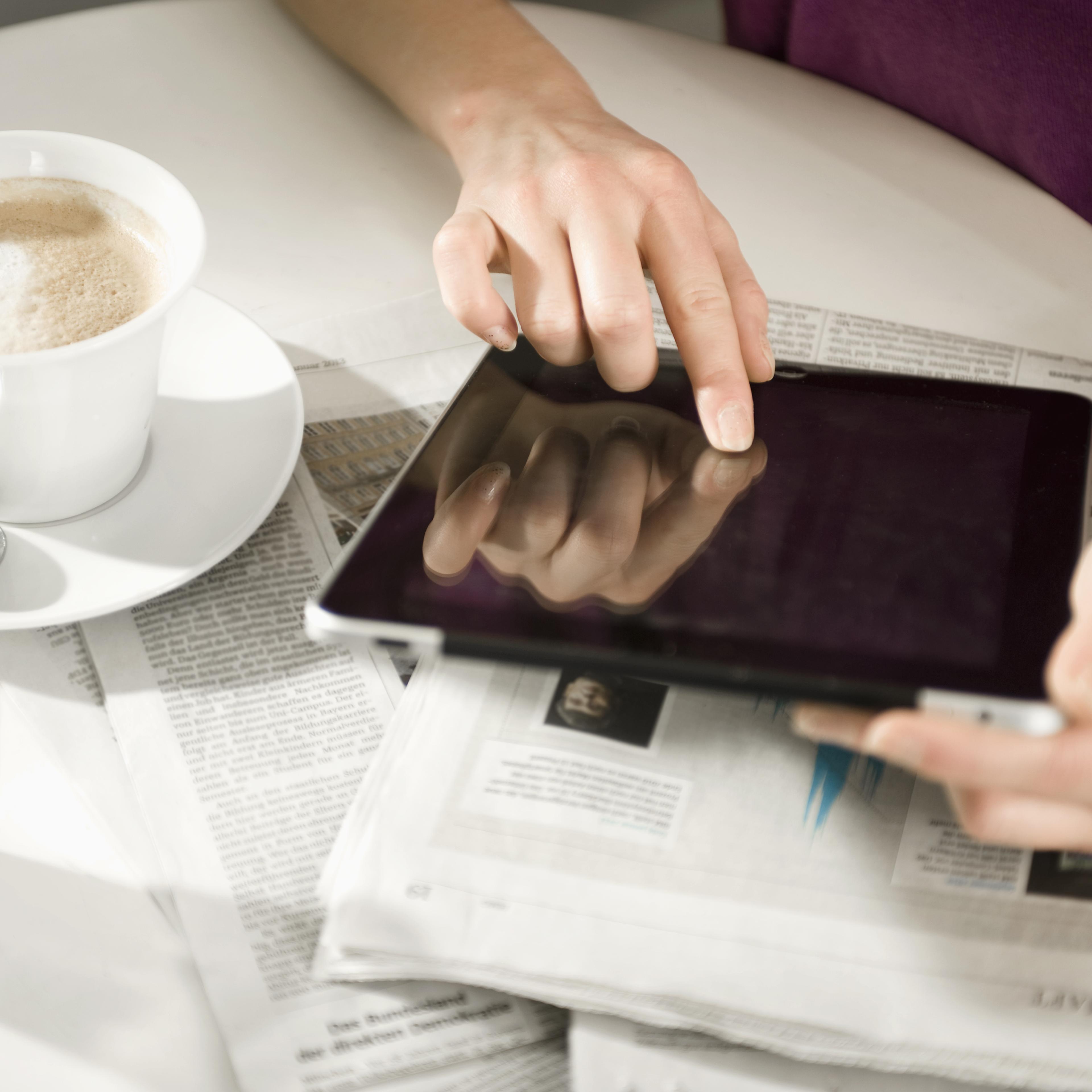 tablet news woman