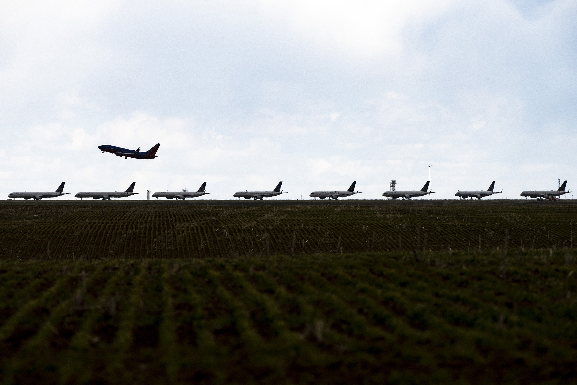 United Planes Sit Parked At Denver International Airport, As The Coronavirus Pandemic Severely Halts Airline Travel