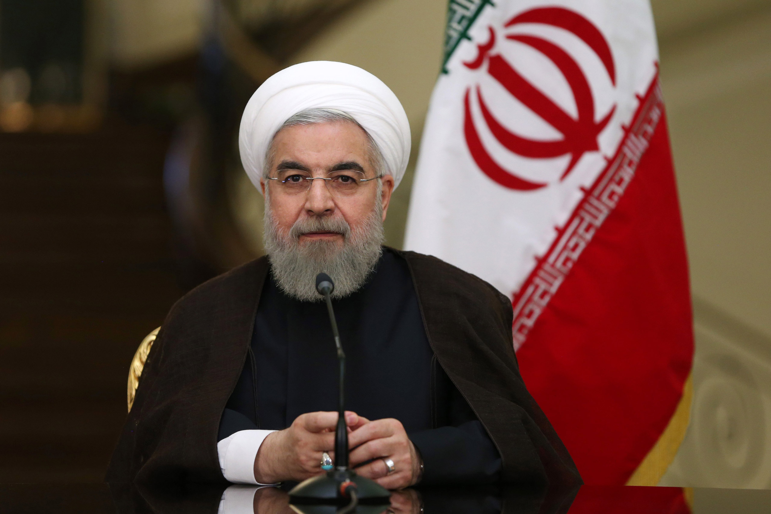 Iranian President Hassan Rouhani speaks with media in a joint press conference with his Austrian counterpart Heinz Fischer after their meeting at the Saadabad Palace in Tehran, Iran, Tuesday, Sept. 8, 2015. Iran's president said on Tuesday that his count