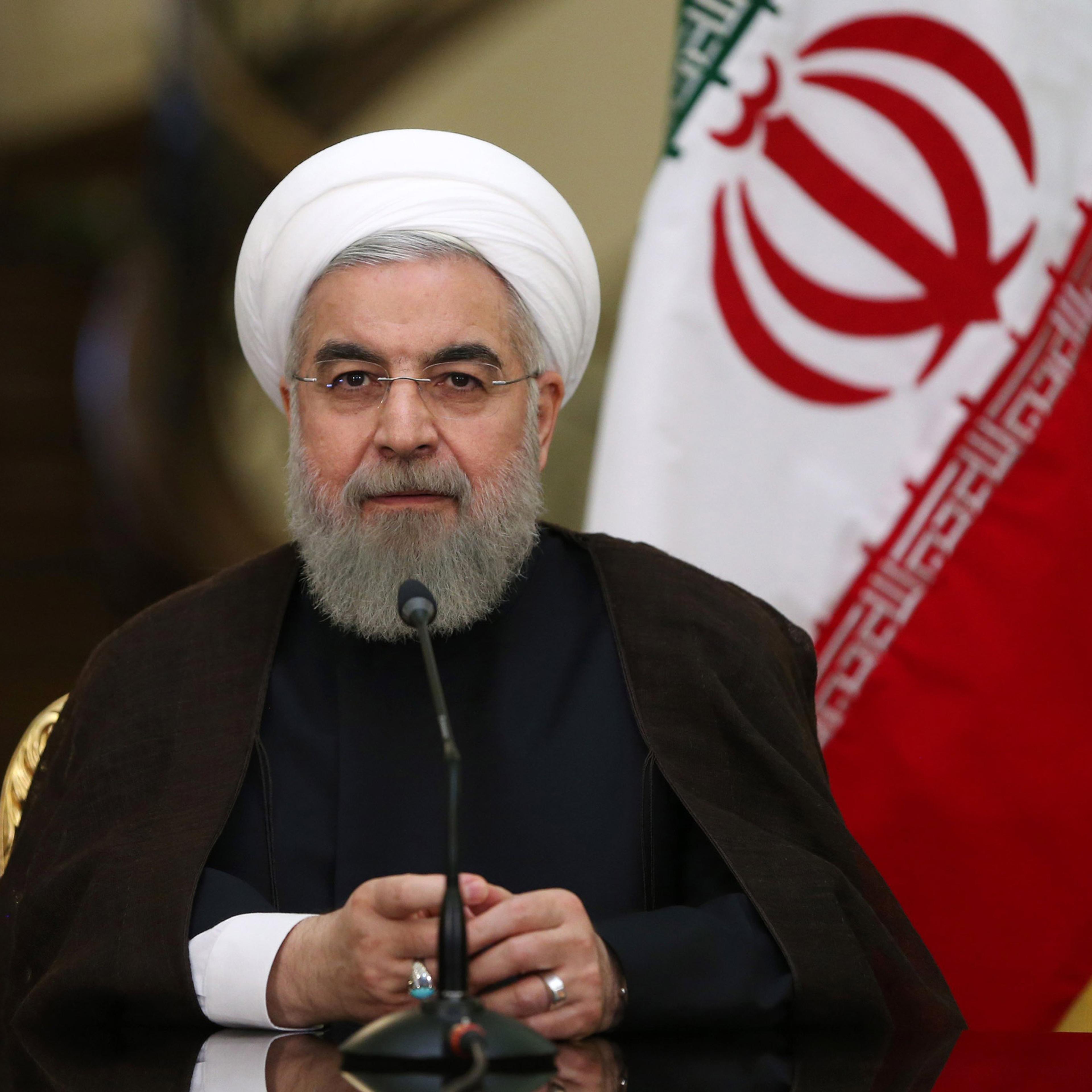 Iranian President Hassan Rouhani speaks with media in a joint press conference with his Austrian counterpart Heinz Fischer after their meeting at the Saadabad Palace in Tehran, Iran, Tuesday, Sept. 8, 2015. Iran's president said on Tuesday that his count