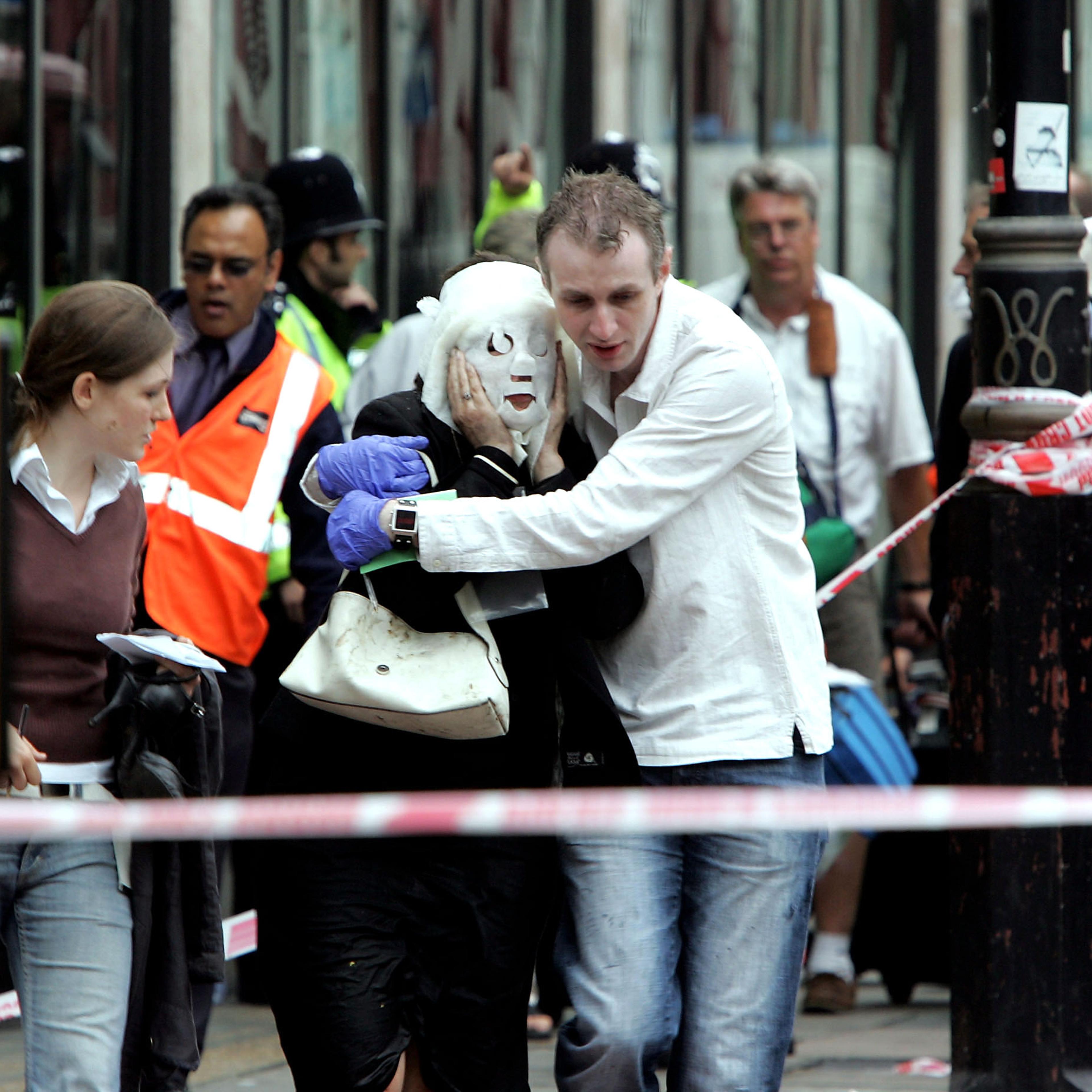 Emergency services assist evacuated passengers at Edgware Road following an explosion which has ripped through London's underground tube network on July 7, 2005 in London, England.