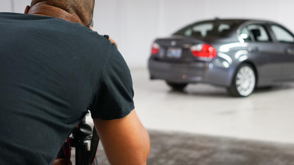 A photographer creates images of a Shift user's car before it's listed on their site, a peer-to-peer marketplace that announced $50 million in funding on Sept. 1. 