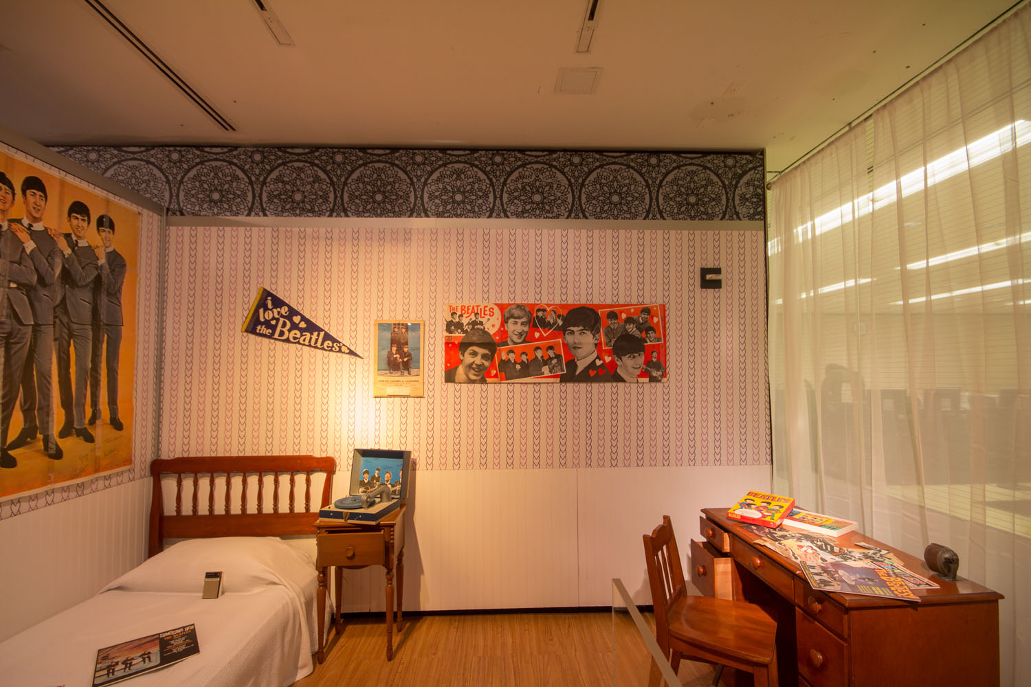 A recreation of a teenage Beatles fan's bedroom.