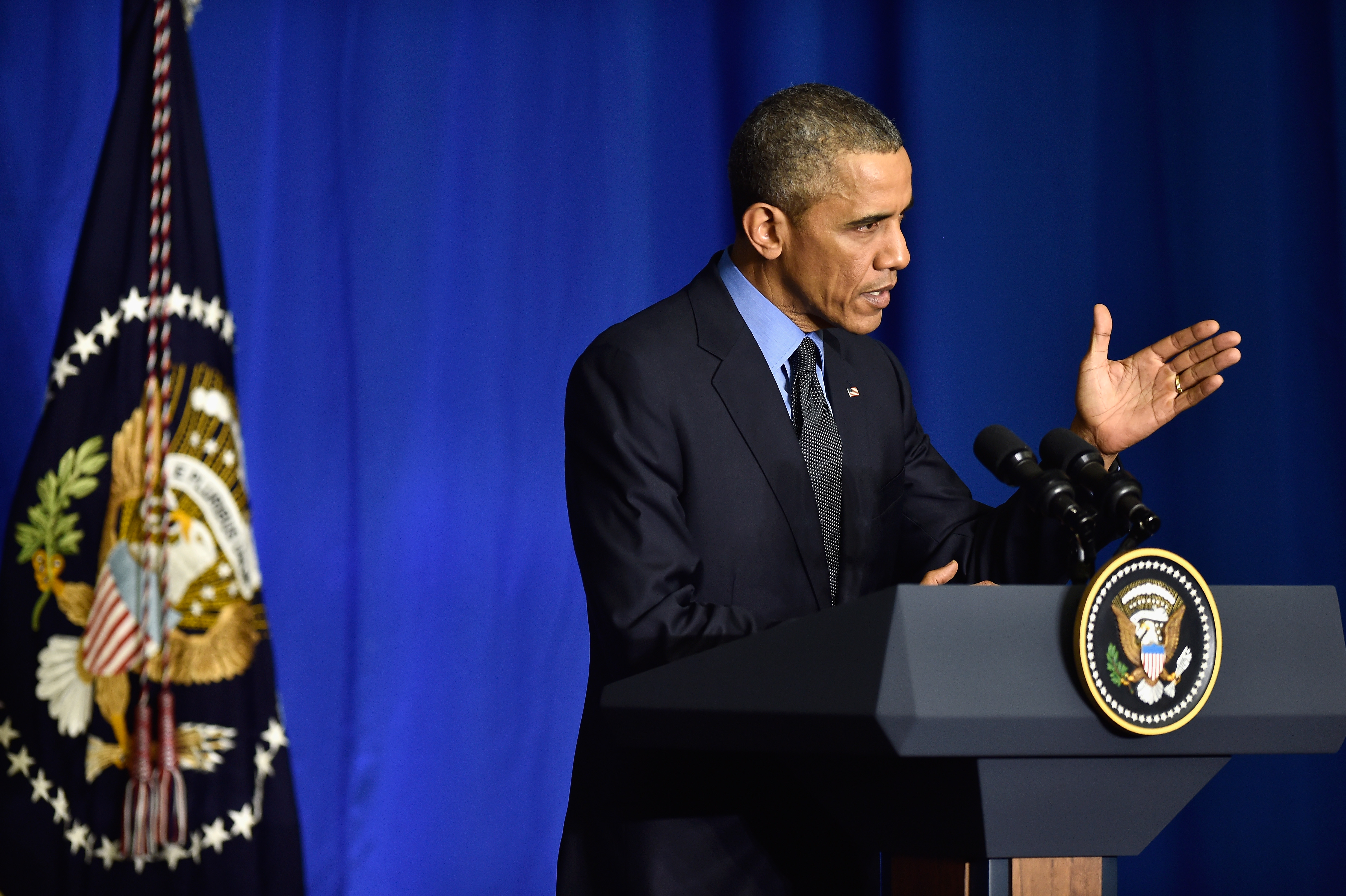 President Barack Obama speaks during a press conference at the OECD Conference Centre before leaving the Conference On Climate Change COP21 on Dec. 1, 2015 in Paris.