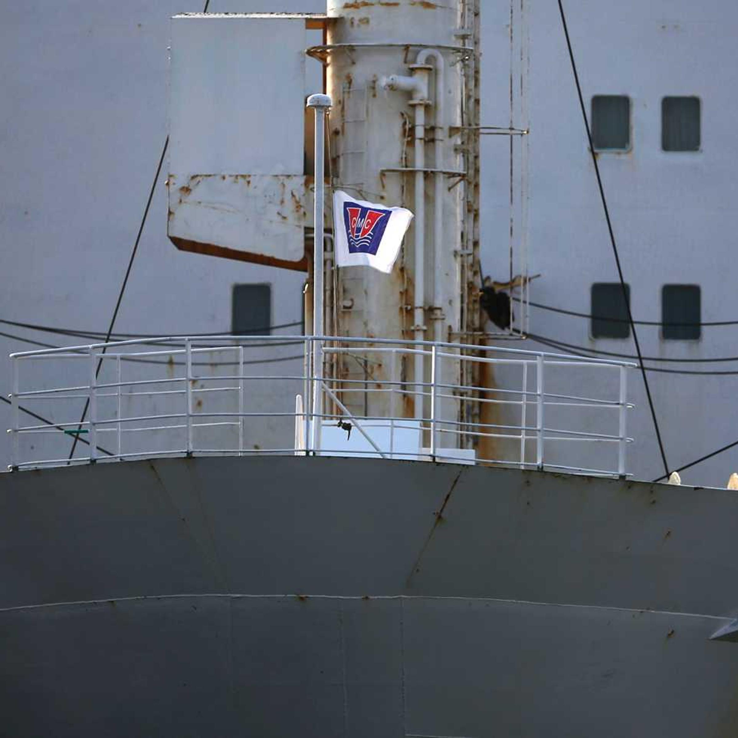 A flag depicting the company logo of Chonghaejin Marine Co flutters on its ferry Ohamana at Incheon Port Passenger Terminal in Incheon April 22, 2014.