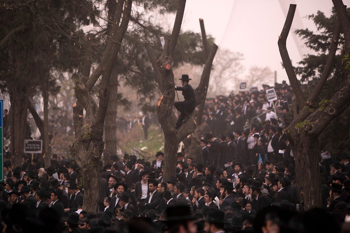 Hundreds of thousands of ultra-Orthodox Jews rally in a massive show of force against plans to force them to serve in the Israeli military, blocking roads and paralyzing the city of Jerusalem, March 2, 2014.