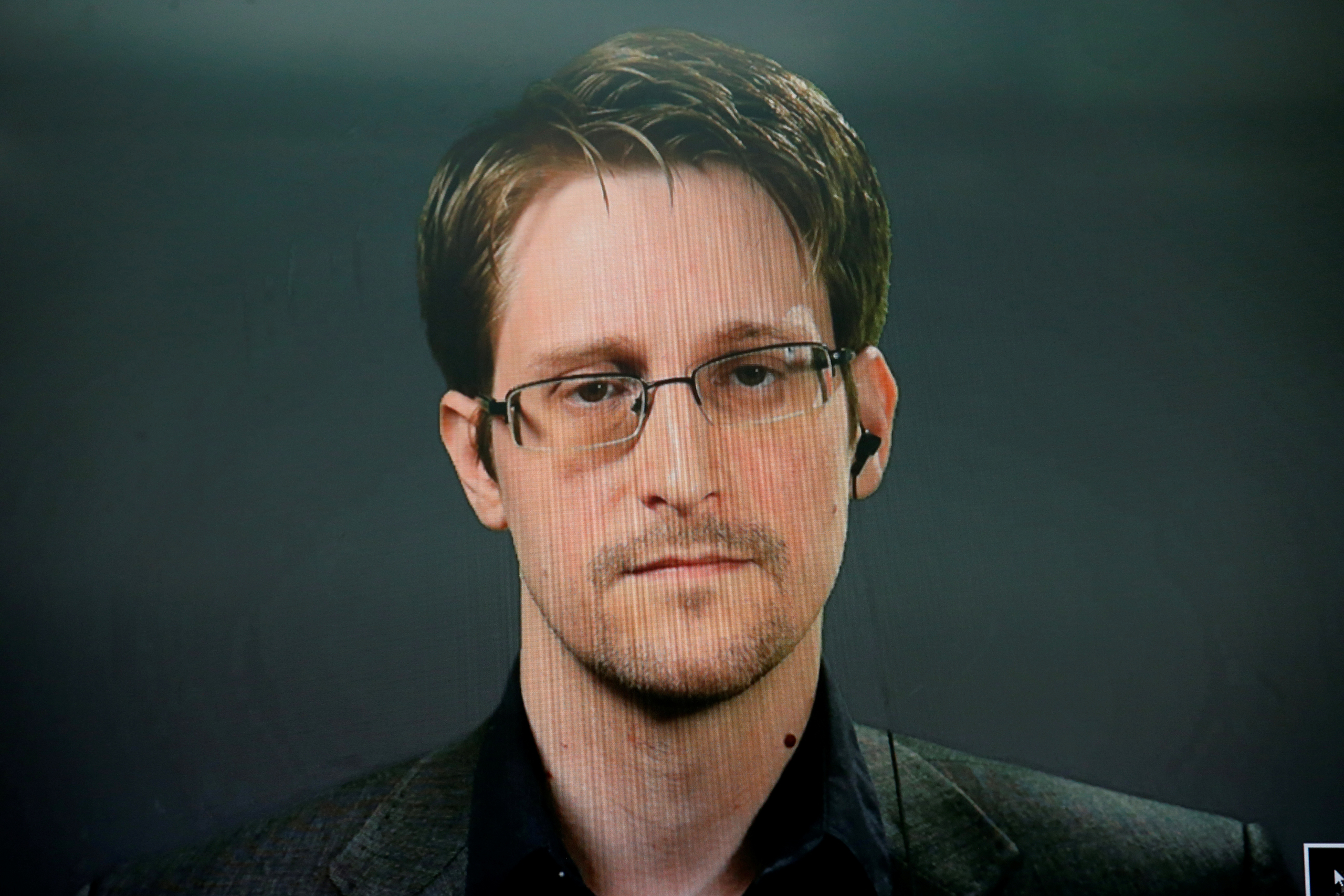 Edward Snowden speaks via video link during a news conference in New York City, U.S. September 14, 2016. REUTERS/Brendan McDermid - RTSNQO2